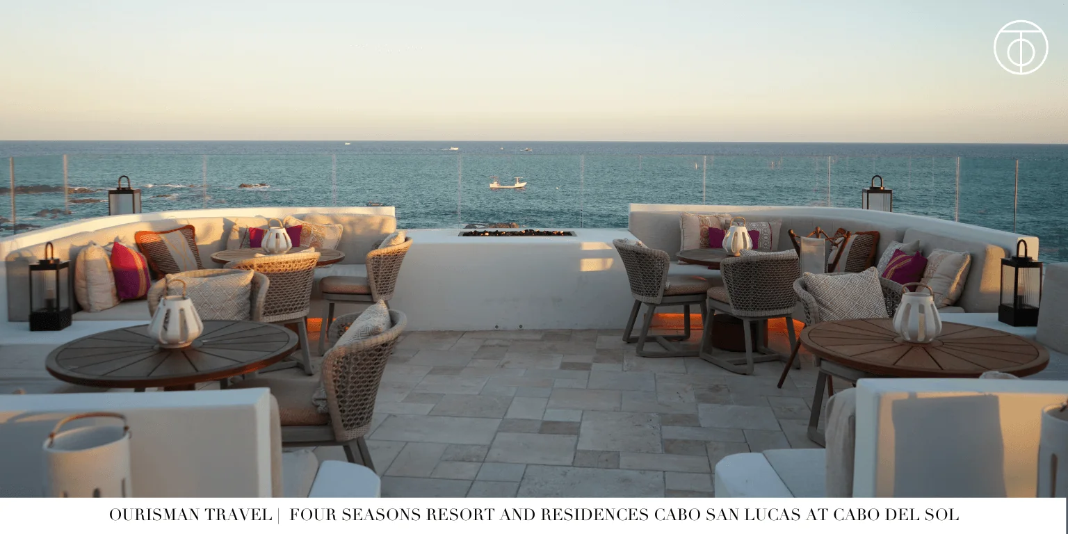 Outdoor firepit dining area by the ocean at Four Seasons Cabo Del Sol