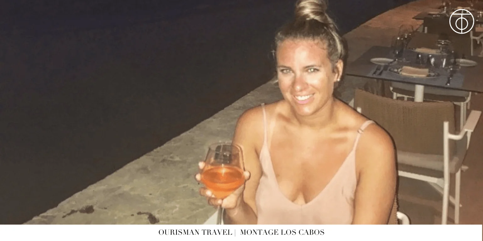Guest enjoying a drink at Montage Los Cabos overlooking the ocean