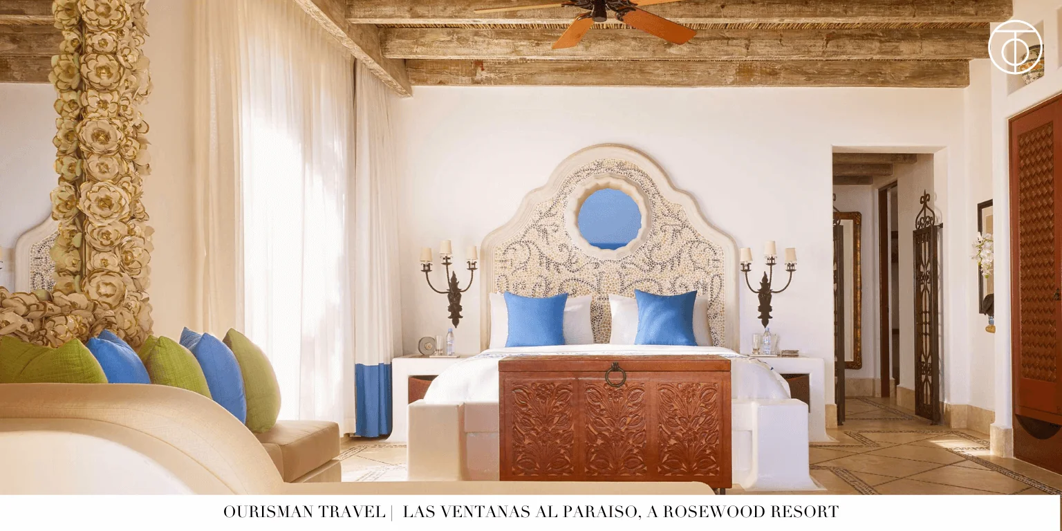 Bedroom suite with carved headboard at Las Ventanas al Paraíso