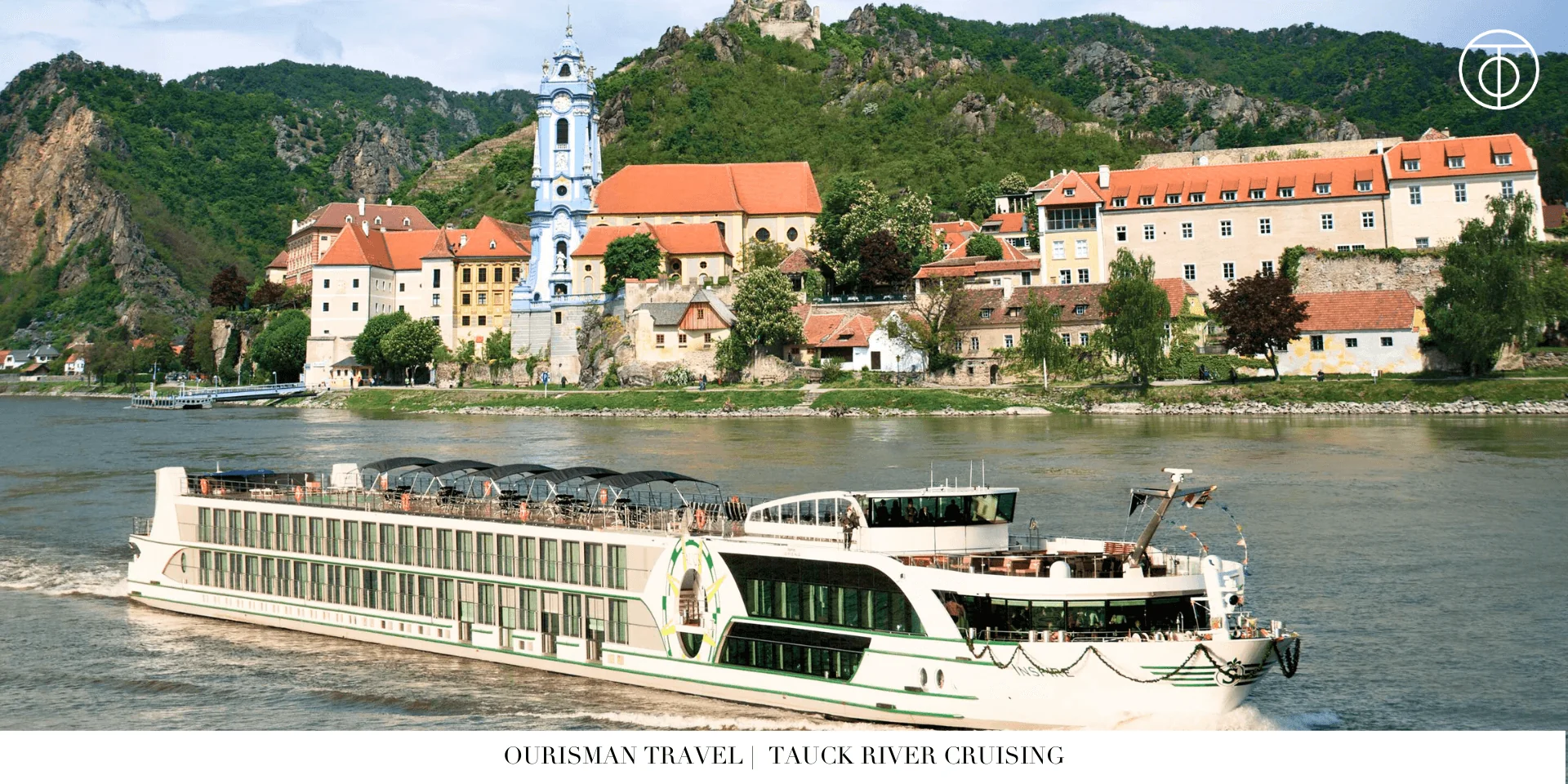 Tauck river cruise ship docked along a historic riverside town in Europe