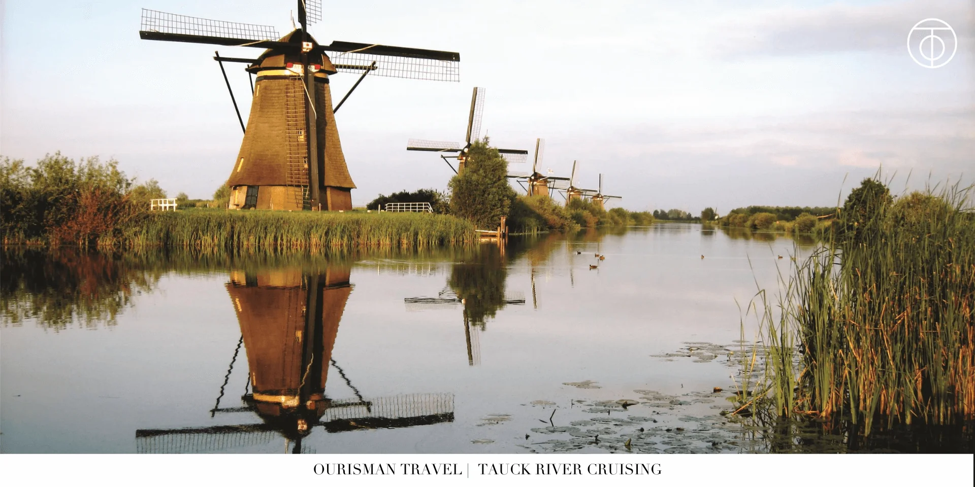 Dutch windmills along a river during a European river cruise