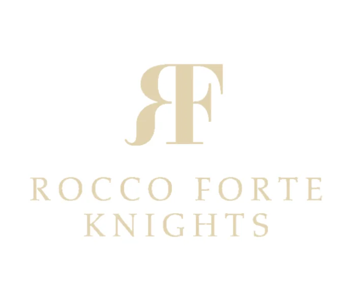 Rocco Forte Knights logo highlighting top Rocco Forte travel agency Ourisman Travel, offering VIP amenities, daily breakfast, room upgrades, and exclusive preferred partner benefits at Rocco Forte Hotels worldwide