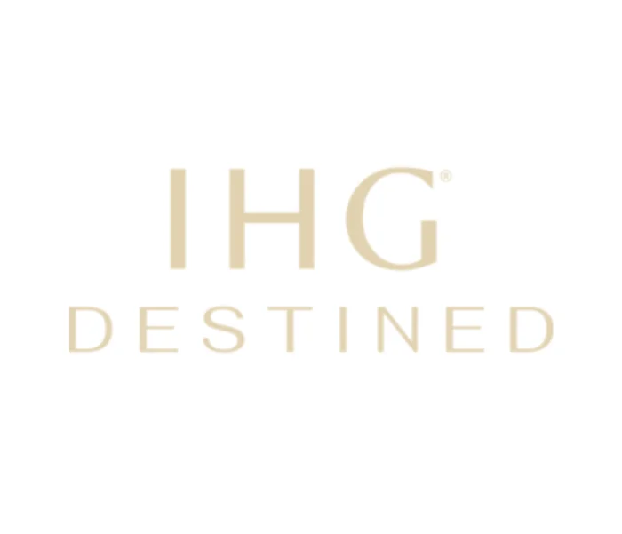 IHG Destined logo highlighting top IHG luxury travel agency Ourisman Travel, offering VIP amenities, daily breakfast, room upgrades, and exclusive preferred partner benefits at participating IHG luxury hotels worldwide