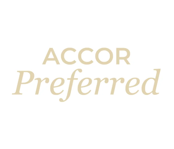 Accor Preferred by HERA logo representing preferred Accor travel advisors offering VIP amenities, room upgrades, daily breakfast, and exclusive benefits at participating Accor luxury hotels and resorts