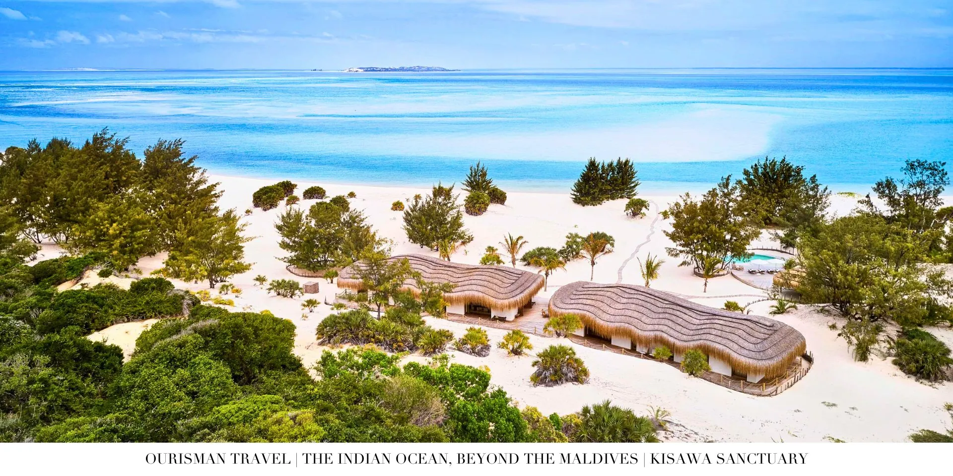 Aerial view of untouched Mozambique coastline with boutique beachfront retreat