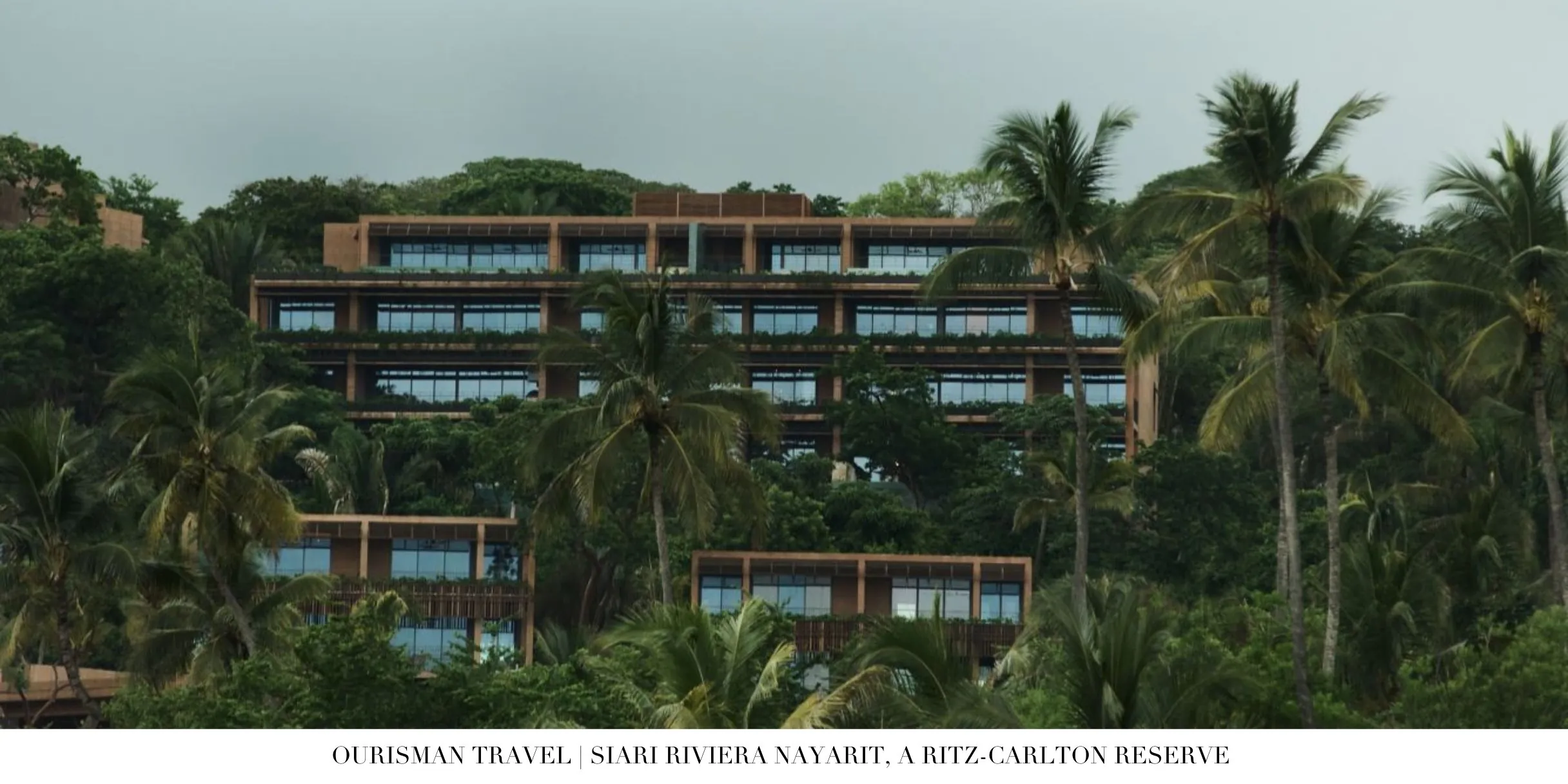 Terraced resort buildings blending into the jungle landscape at Sīari Riviera Nayarit