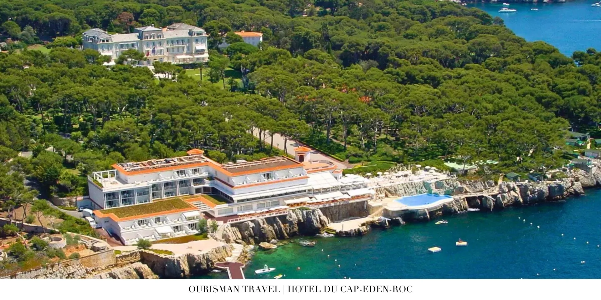 Aerial view of Hotel du Cap-Eden-Roc with gardens, terraces, and turquoise coastal waters