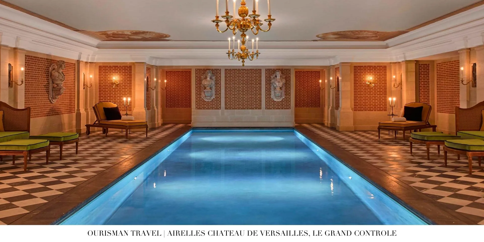 Indoor pool at Le Grand Contrôle, Airelles Château de Versailles, featuring elegant design and serene garden views through large windows