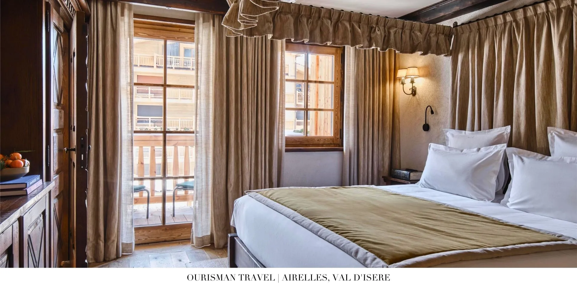 Luxury guest bedroom at Airelles, Val d’Isère with cozy alpine décor and mountain views