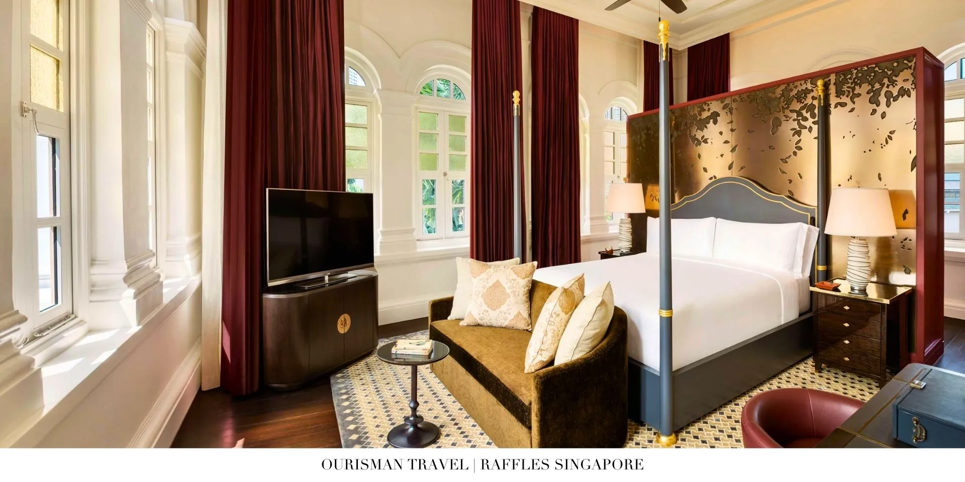 Luxury suite bedroom at Raffles Singapore with elegant furnishings and city views