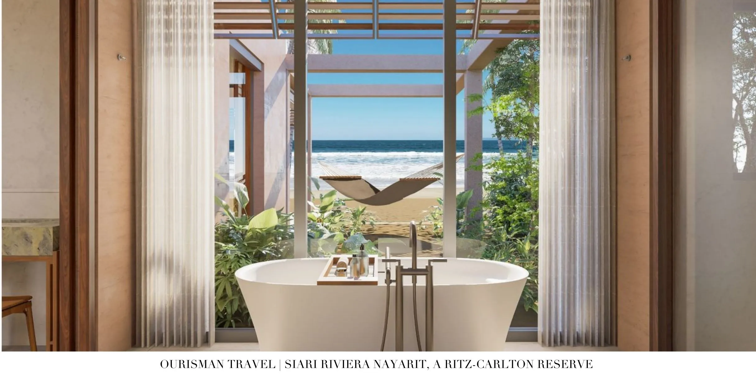 Freestanding soaking tub with ocean view at Sīari Ritz-Carlton Reserve