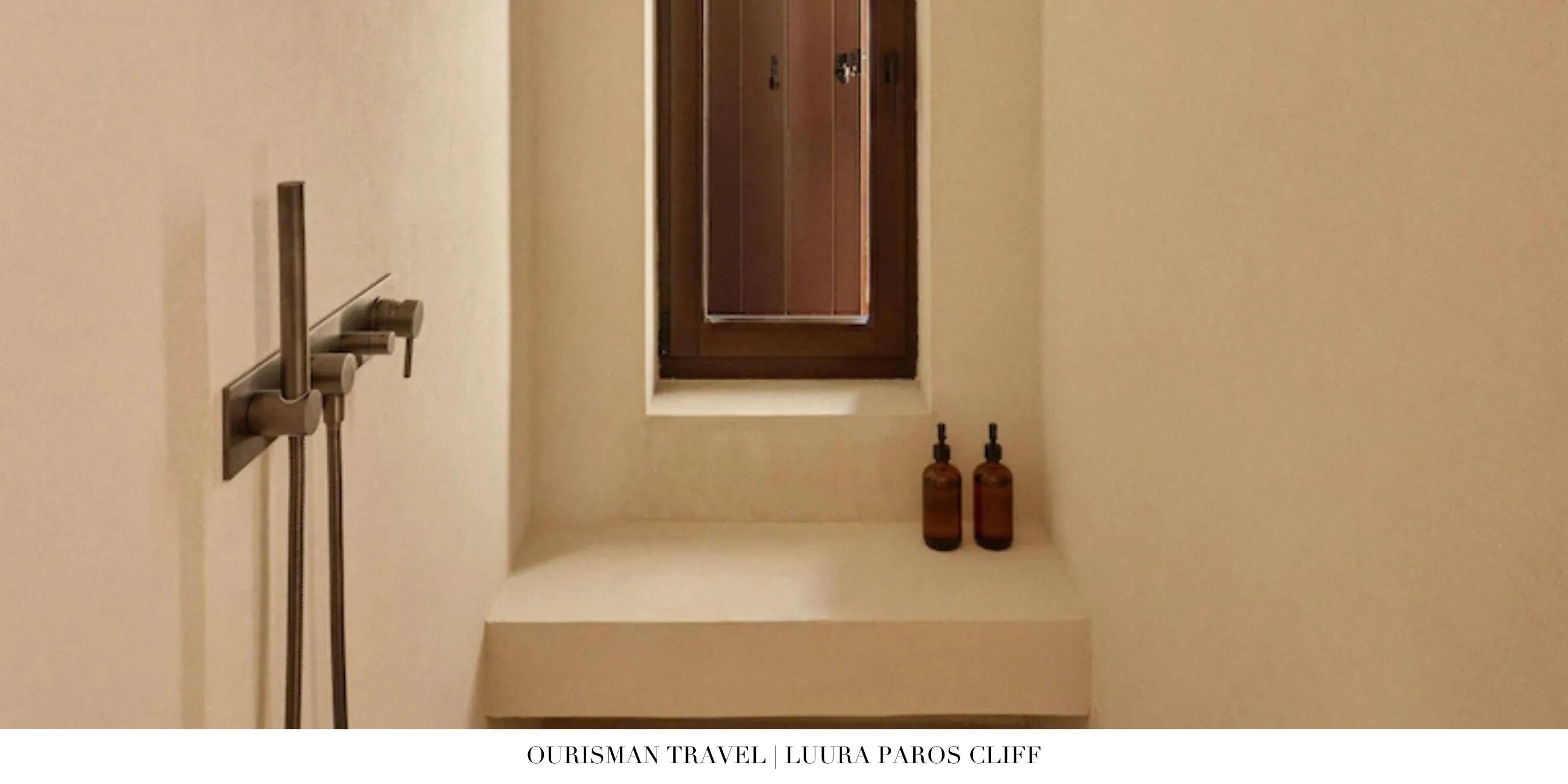 Spa-inspired bathroom with freestanding tub at Luura Paros Cliff