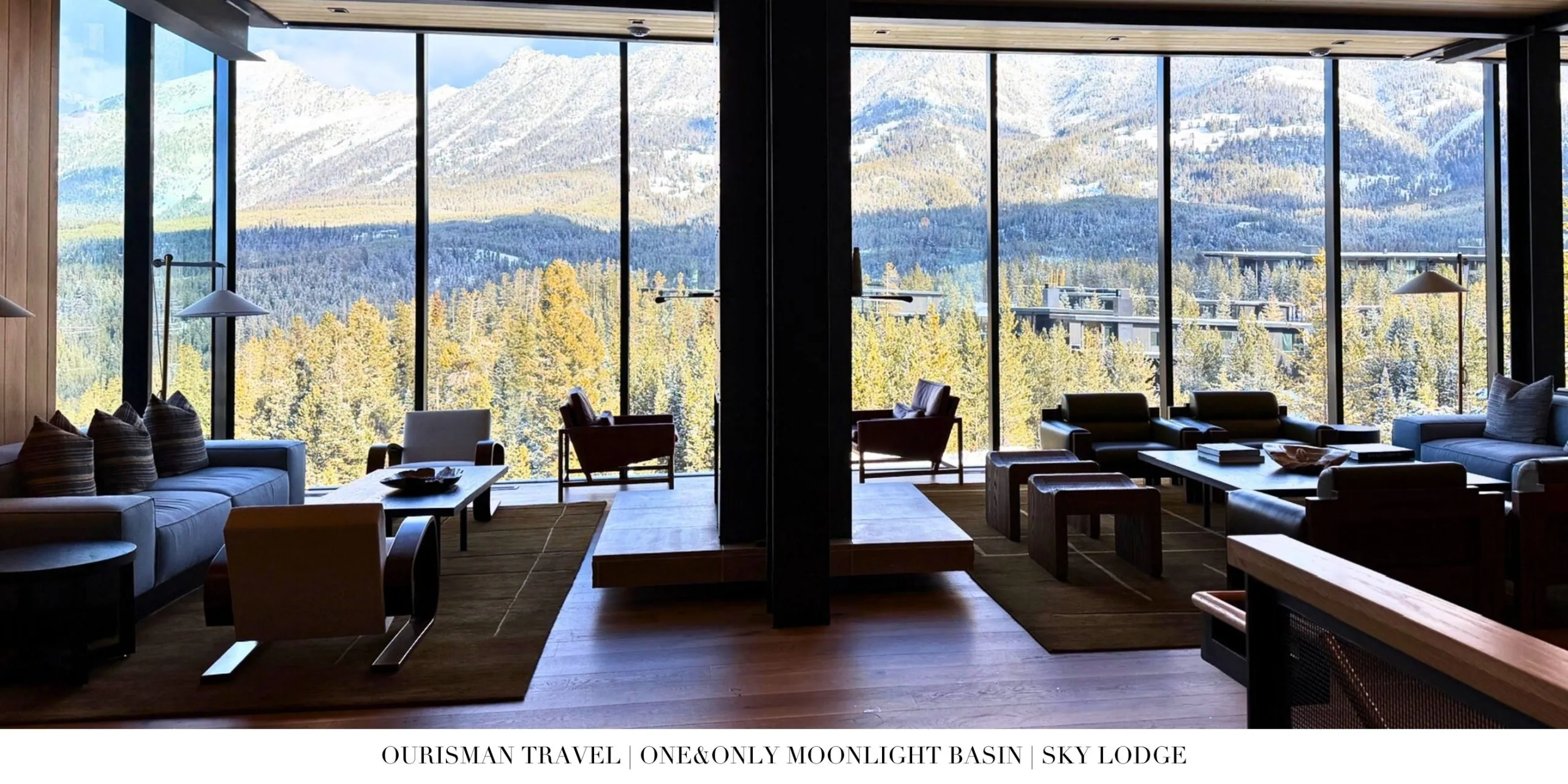 Cozy lounge seating inside Sky Lodge at One&Only Moonlight Basin overlooking snow-covered Montana mountains.