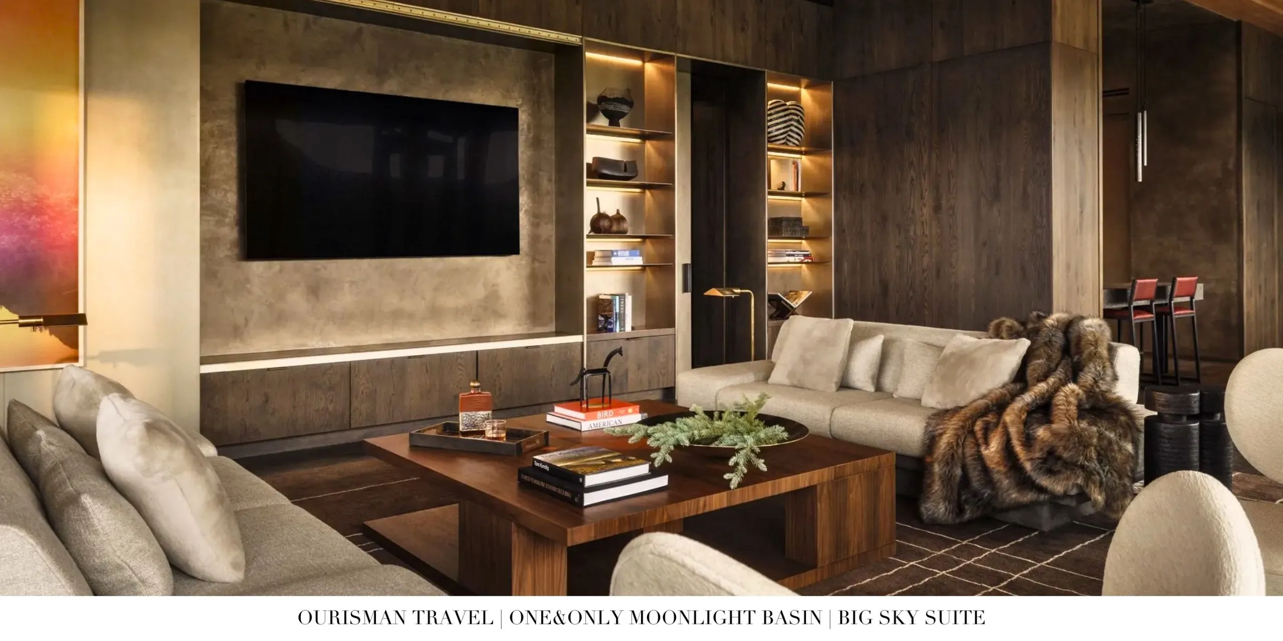 Big Sky Suite at One&Only Moonlight Basin featuring a spacious open-concept living area with floor-to-ceiling windows overlooking the Montana mountains.