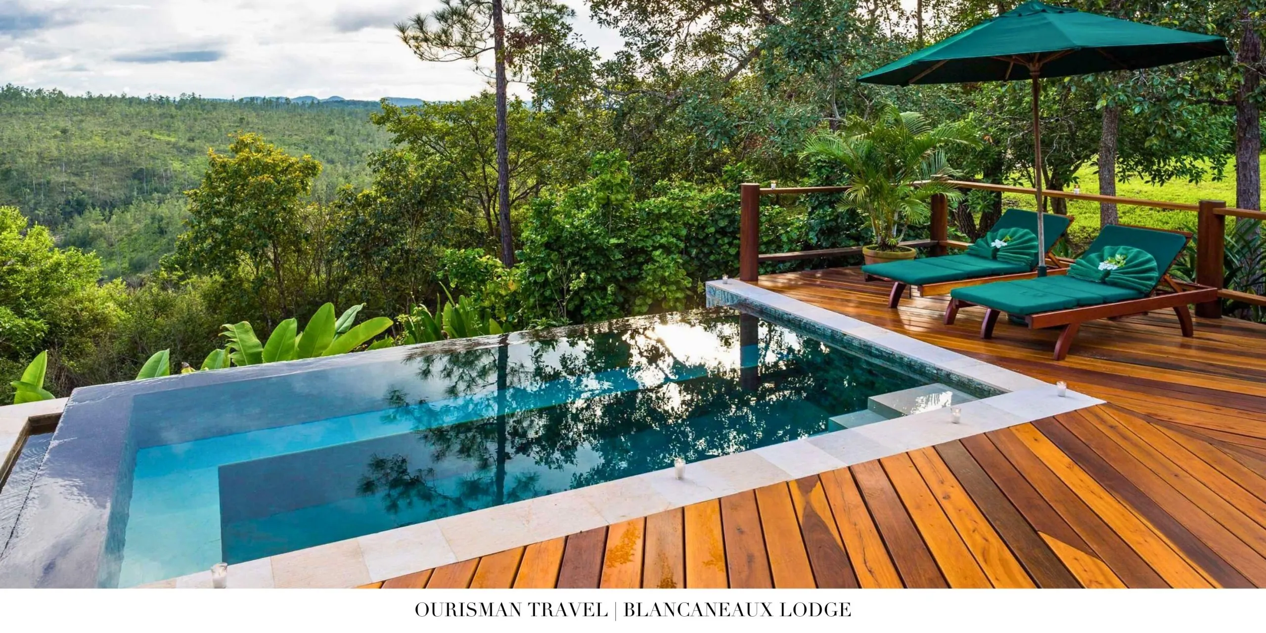 Infinity pool at Blancaneaux Lodge surrounded by lush foliage
