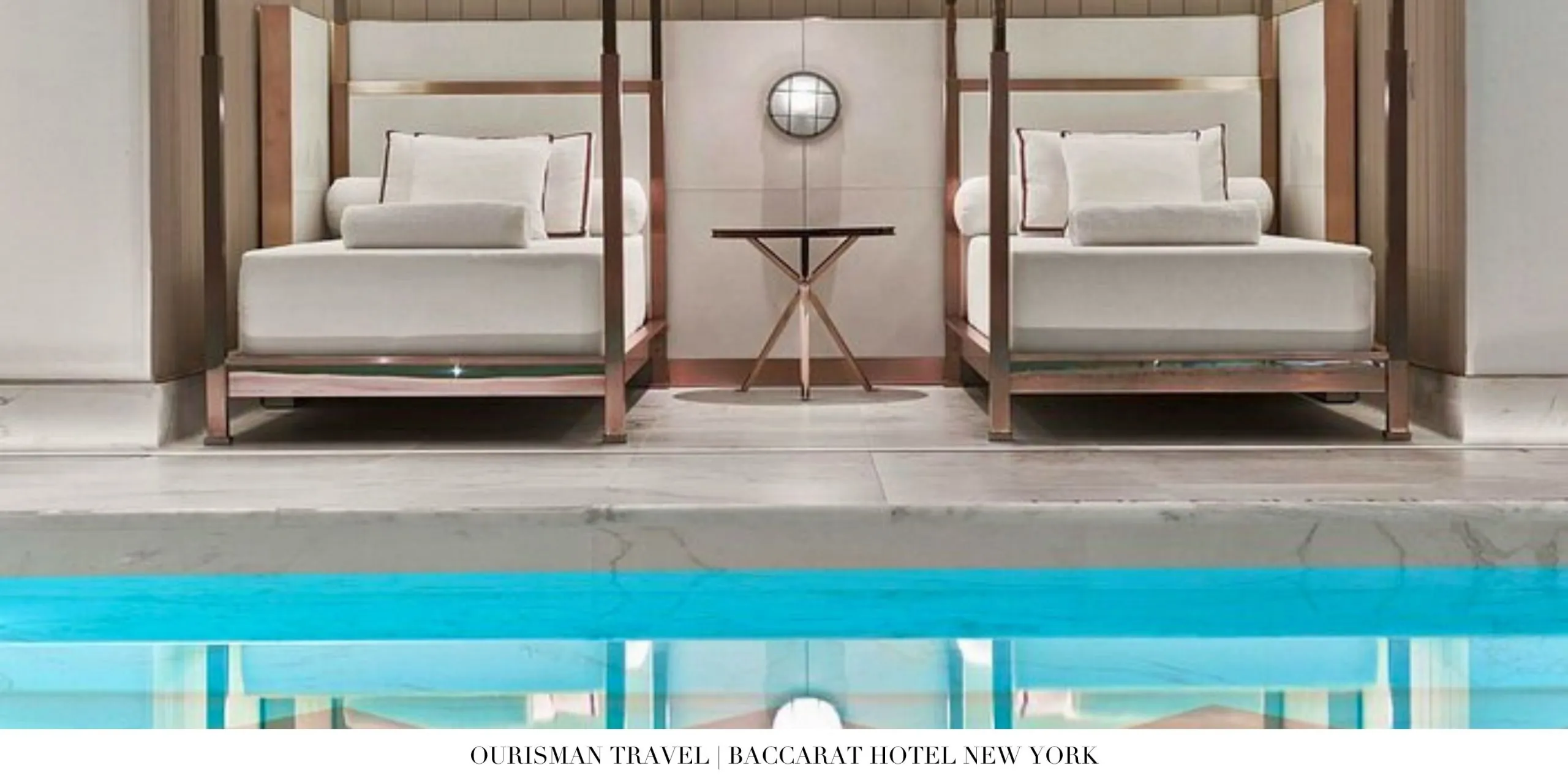 Luxury indoor pool surrounded by elegant lounge chairs at Baccarat Hotel New York