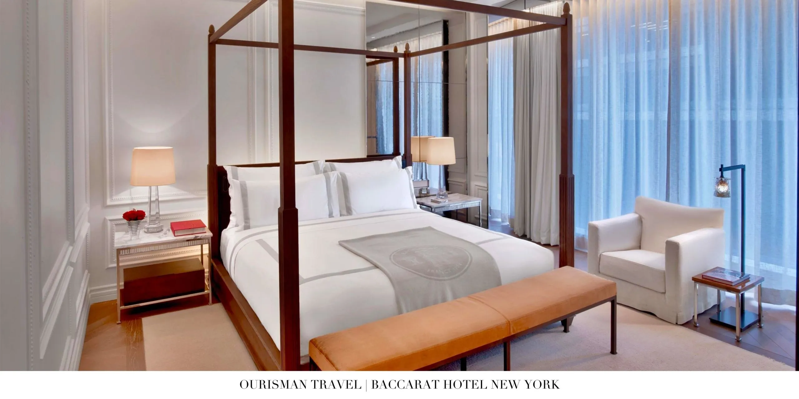 Sophisticated bedroom design with floor-to-ceiling windows at Baccarat Hotel New York