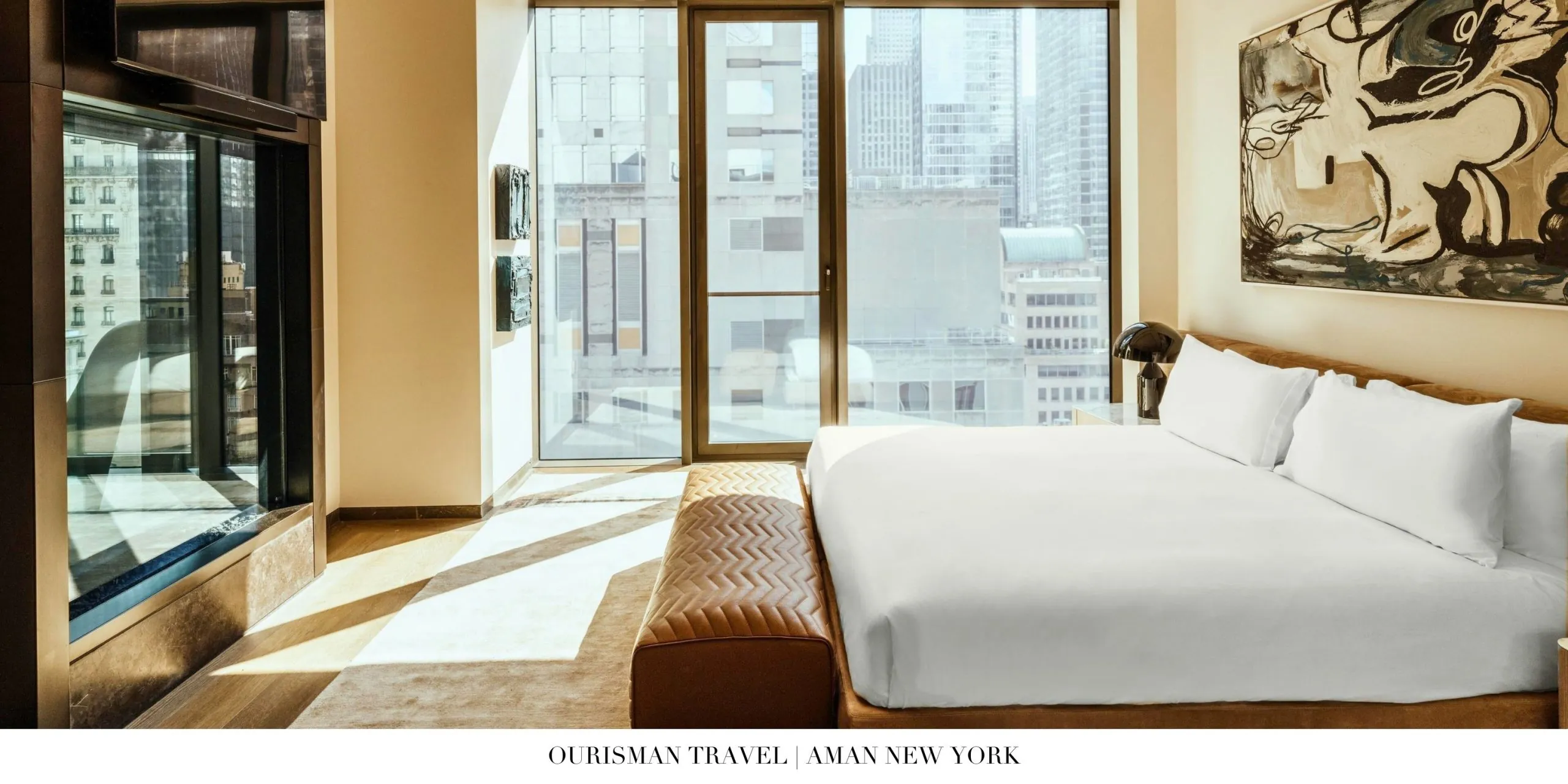 Elegant bedroom interior with city views at Aman New York