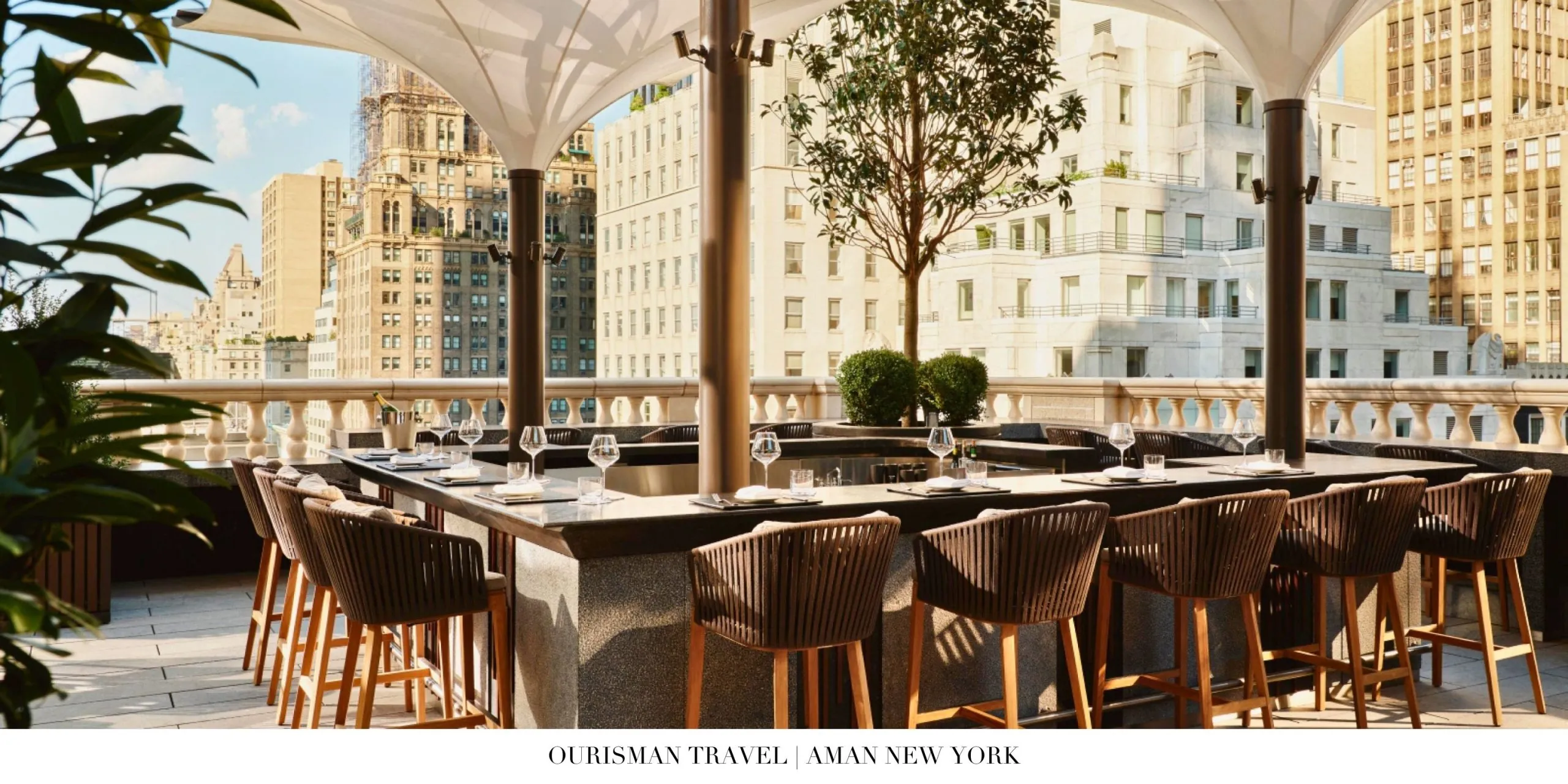 Elegant rooftop hotel bar with contemporary design at Aman New York