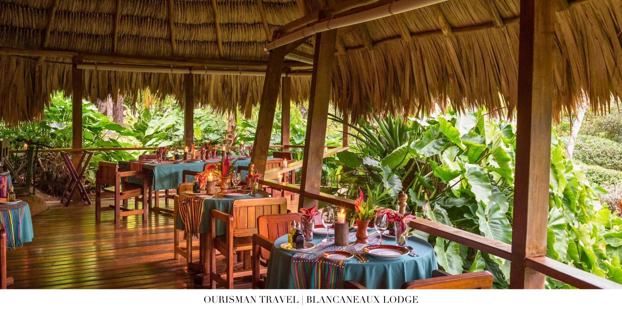 Dining experience at Blancaneaux Lodge with panoramic rainforest backdrop