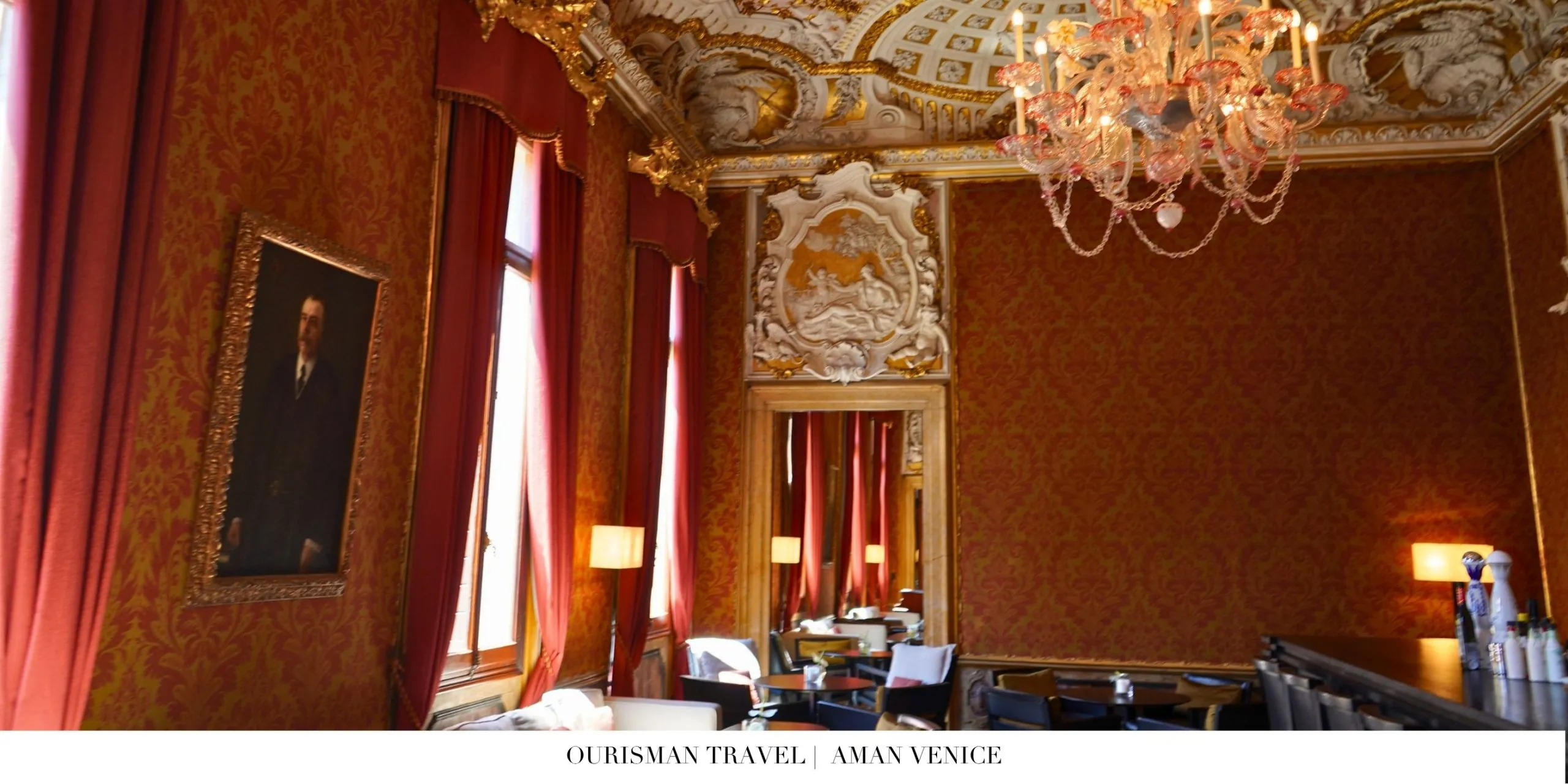 Aman Venice bar and lounge with plush seating and historic interiors