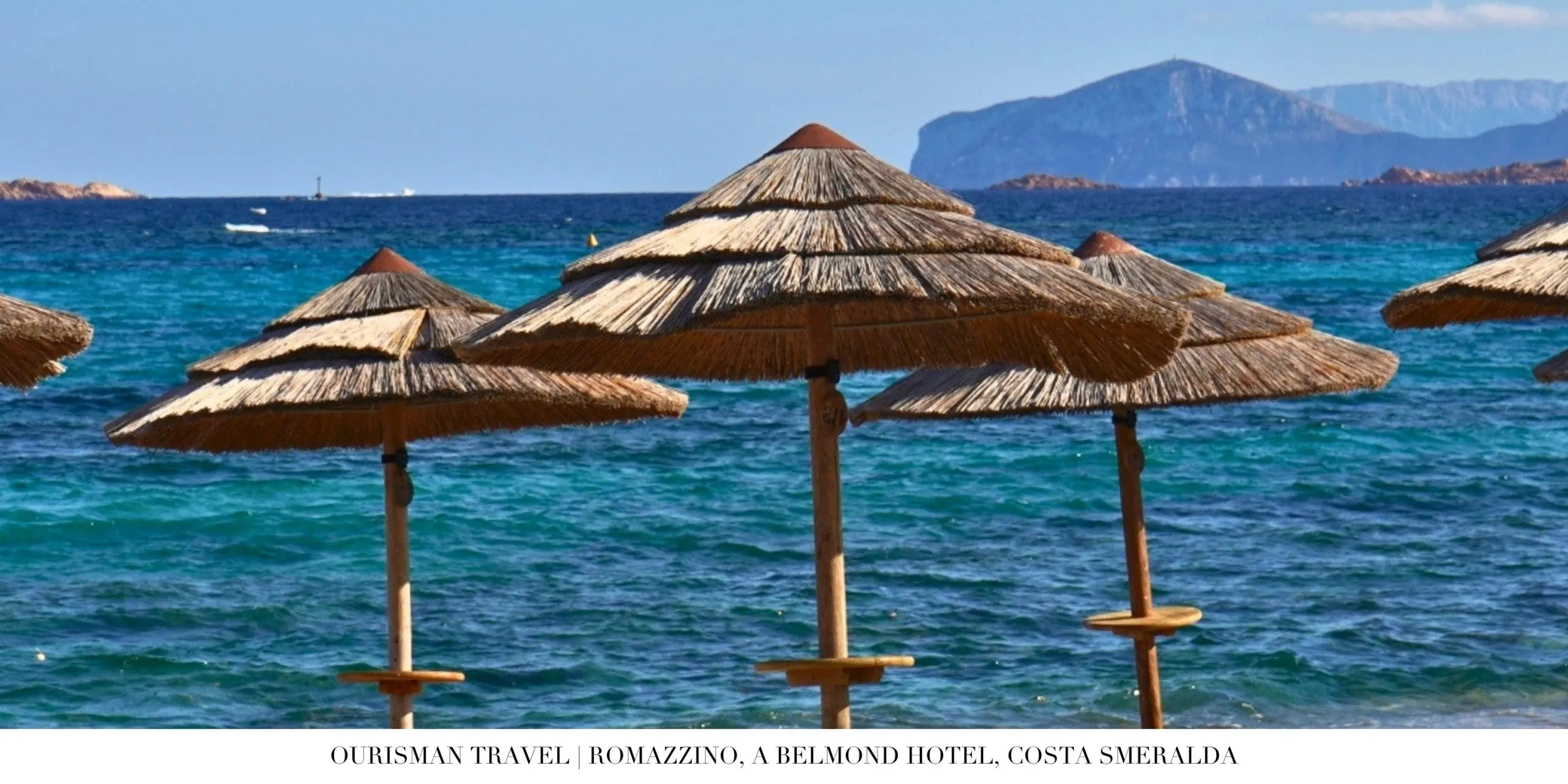 Secluded beach setting at Romazzino Belmond with gentle waves and sand