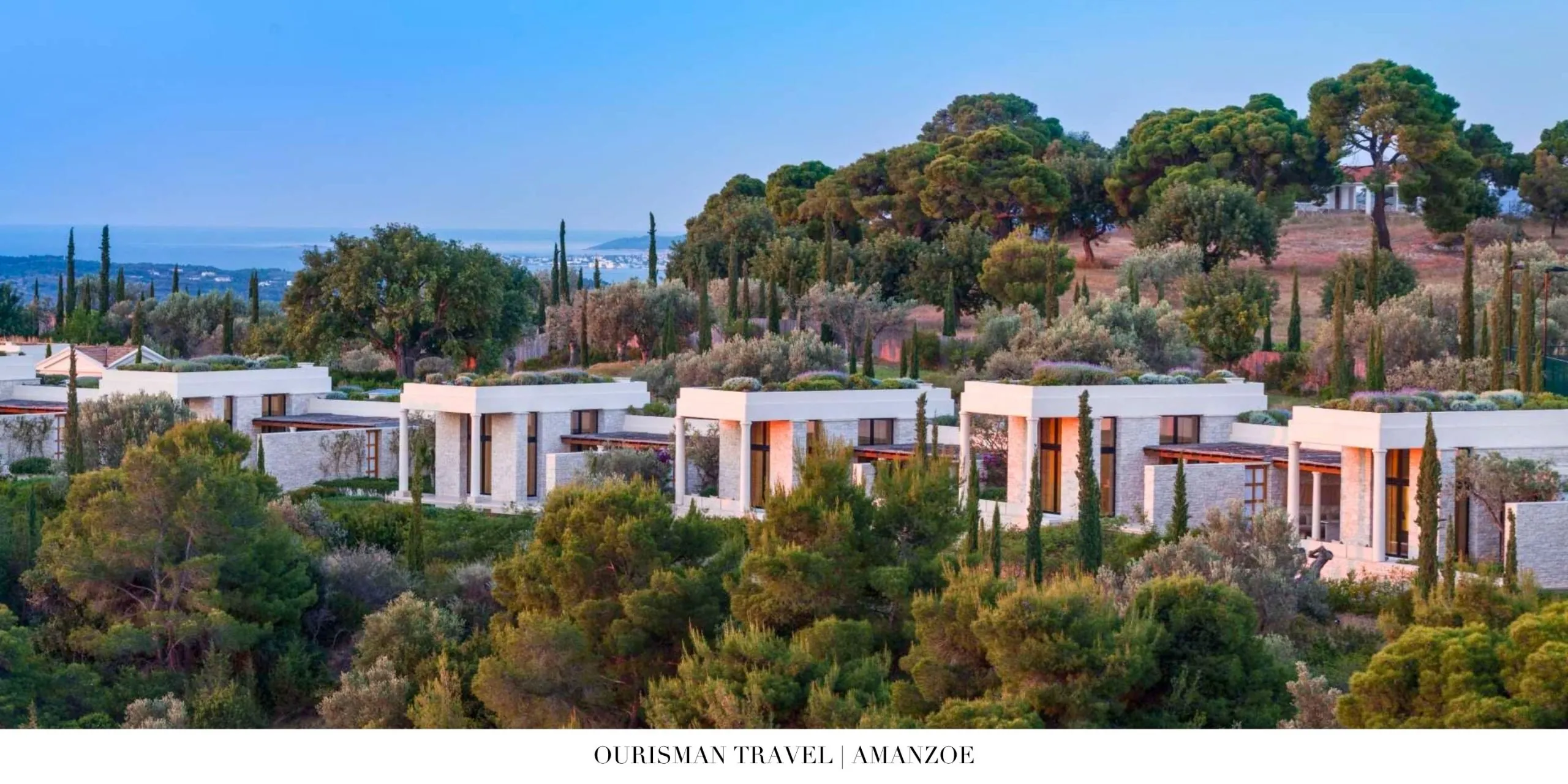 Secluded hilltop sanctuary at Amanzoe featuring classical Greek architecture, expansive pavilions, and sweeping Aegean vistas