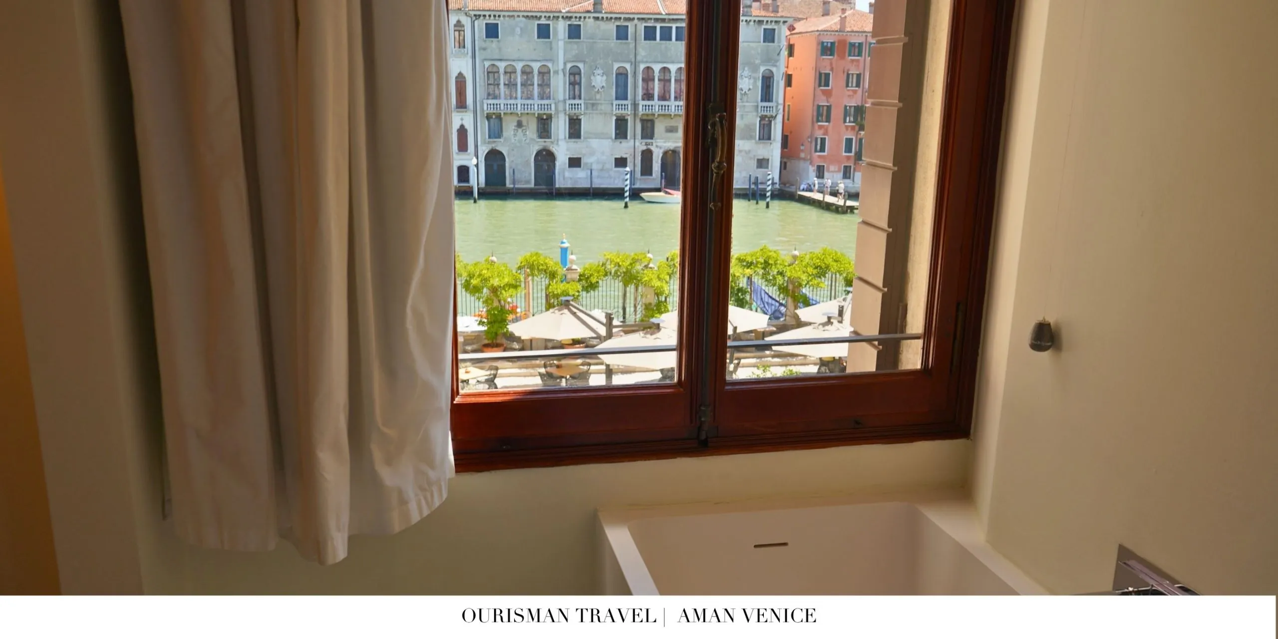 Luxurious bathroom at Aman Venice with soaking tub and elegant details