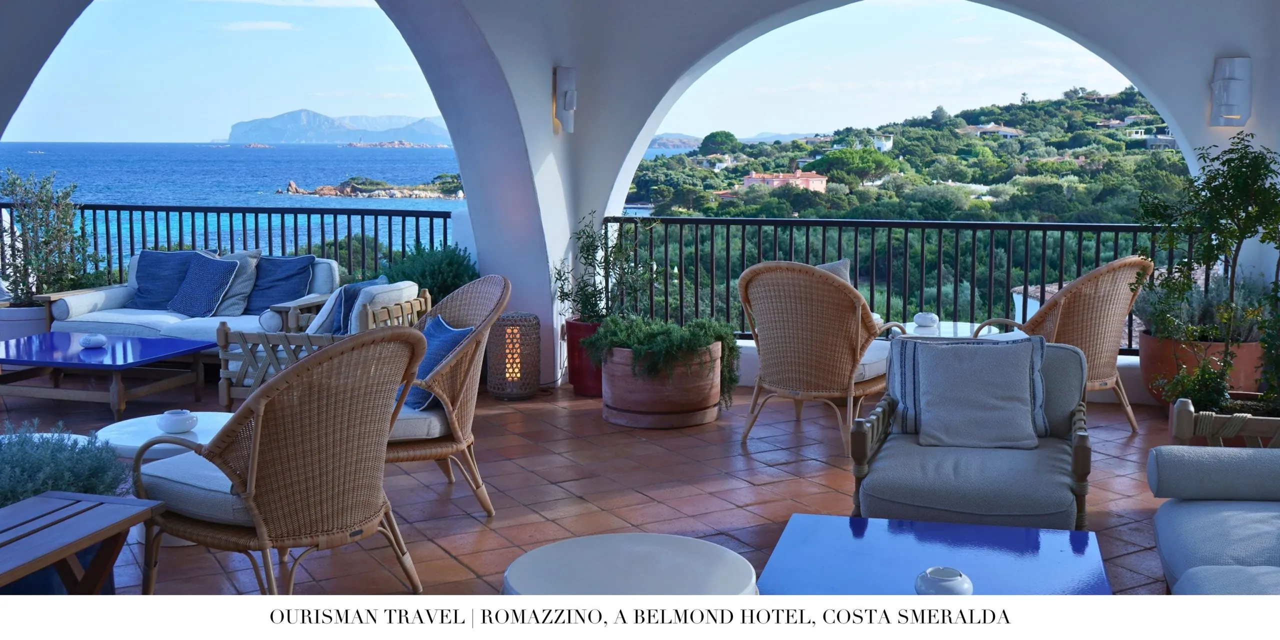 Open-air dining setting at Romazzino Belmond surrounded by lush gardens