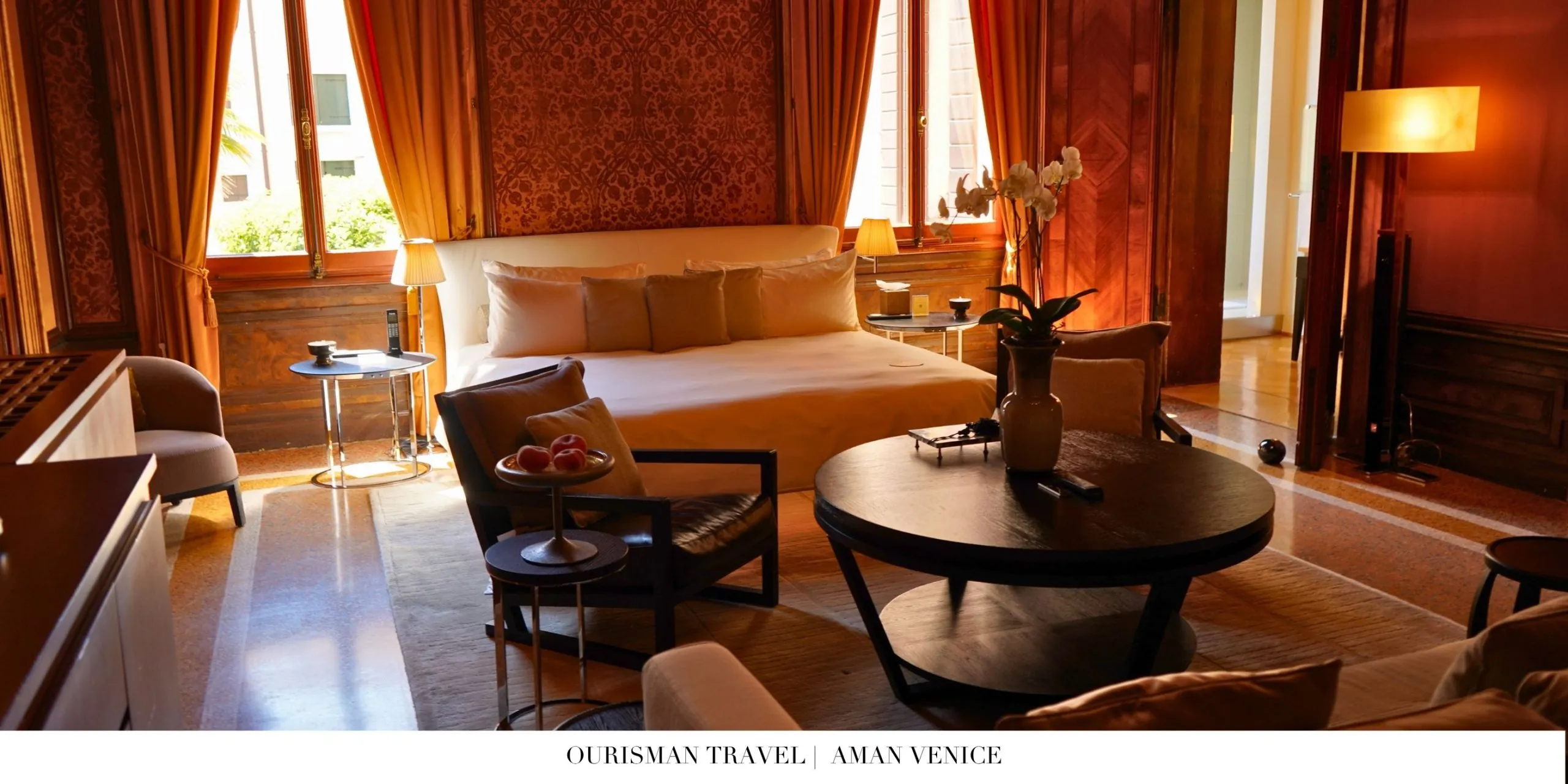 Elegant guest room at Aman Venice with classic Venetian design