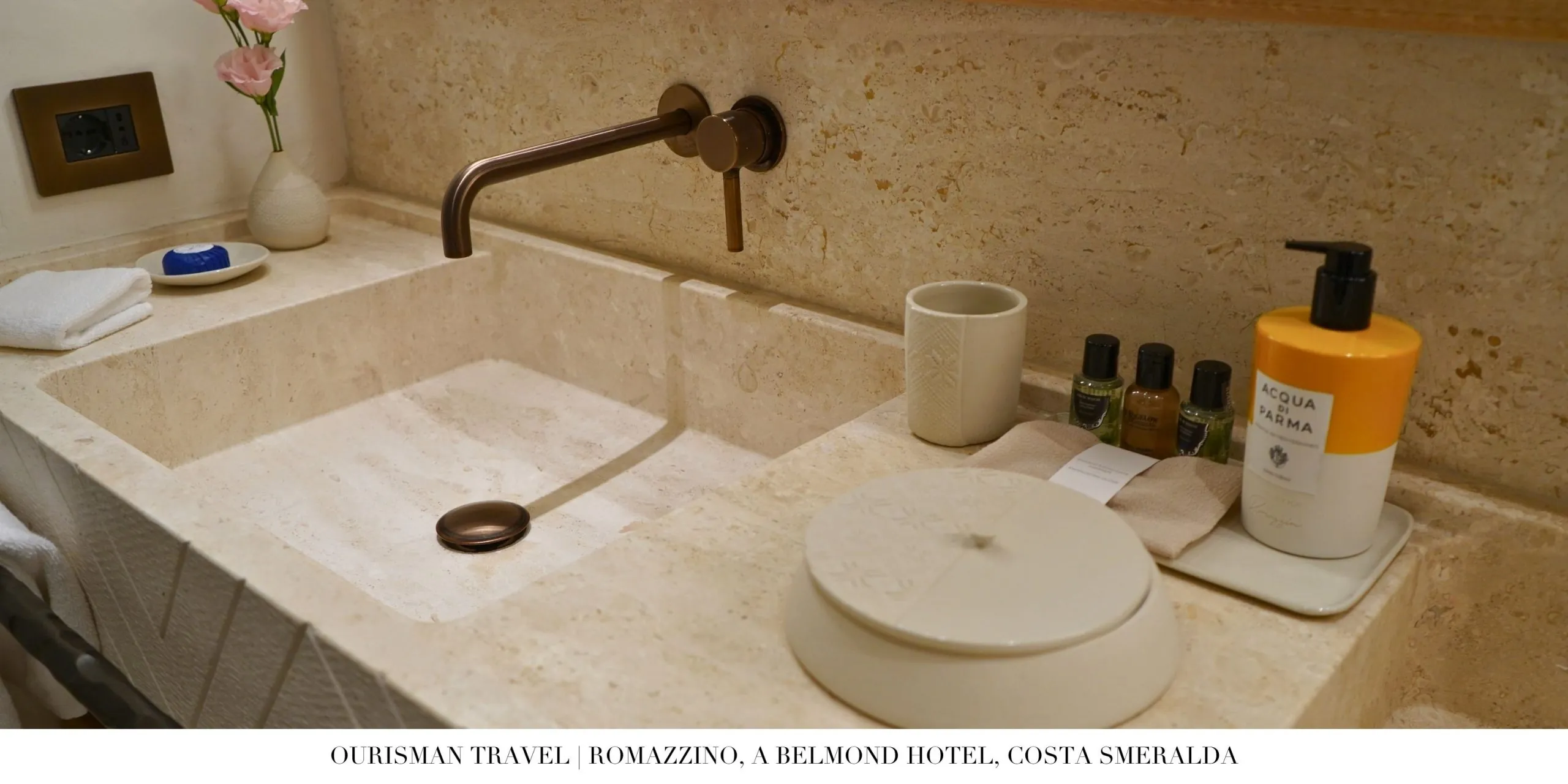 Luxury suite bathroom at Romazzino Belmond with marble finishes and soaking tub