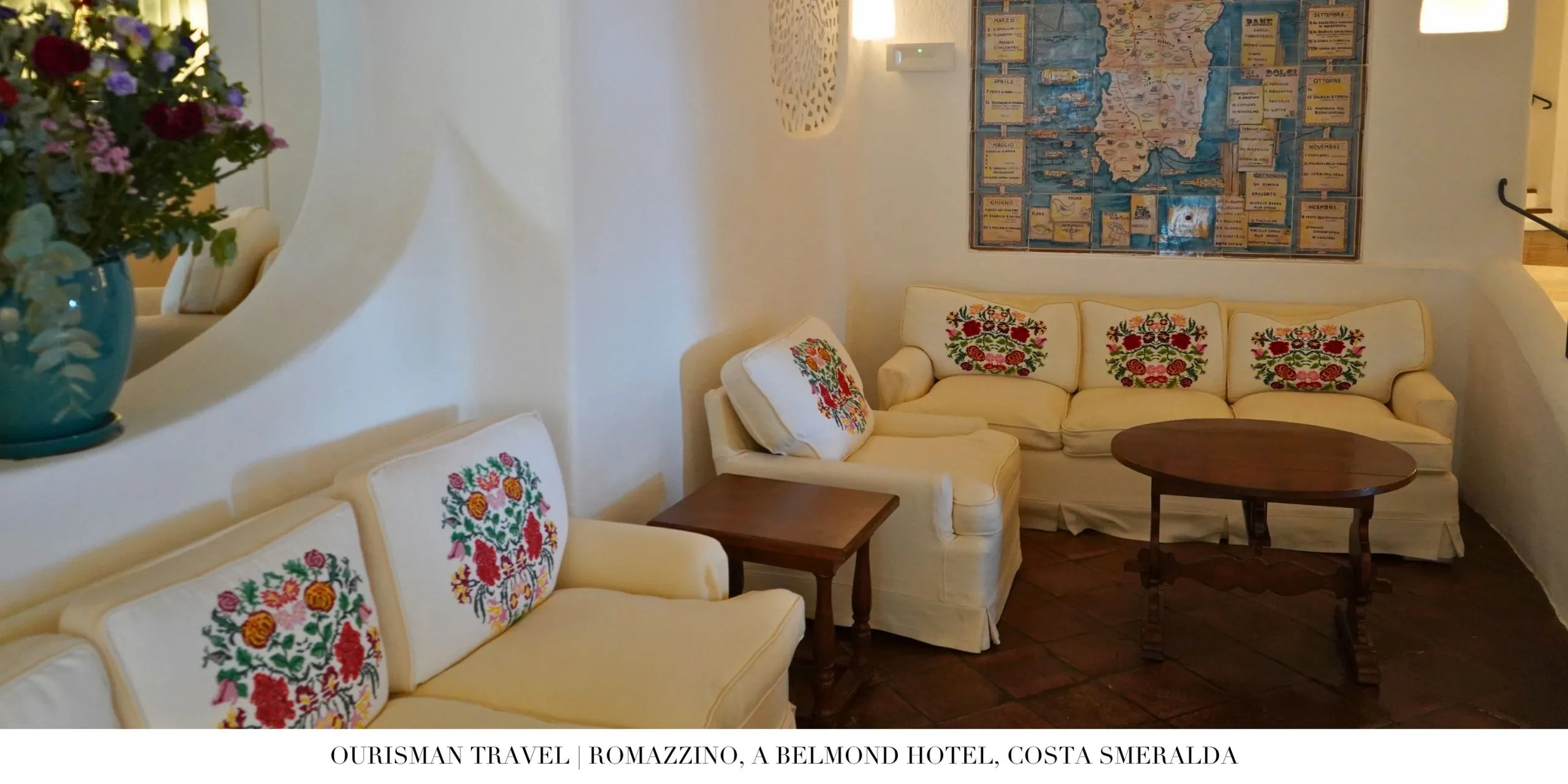 Entrance arrival area at Romazzino Belmond with curved archways and lush landscaping