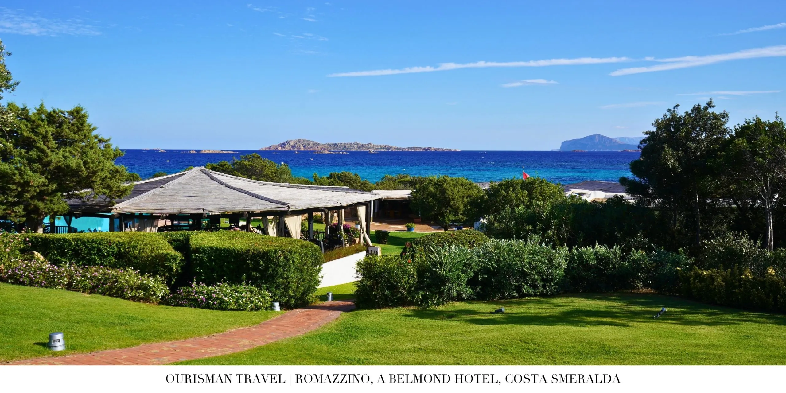 Dining terrace at Romazzino, A Belmond Hotel overlooking the Mediterranean Sea
