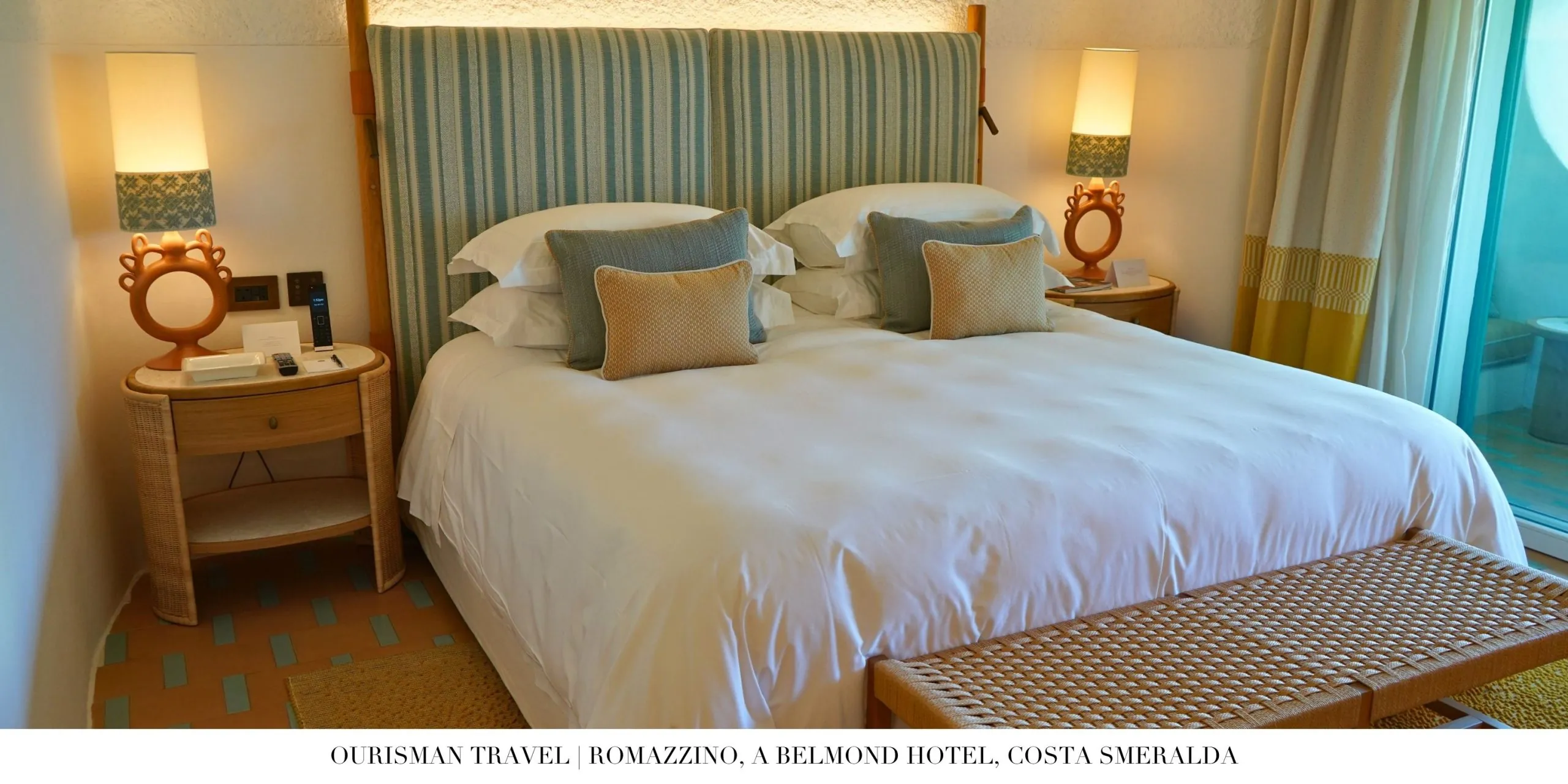 Classic guest room at Romazzino Belmond with whitewashed walls and natural textures