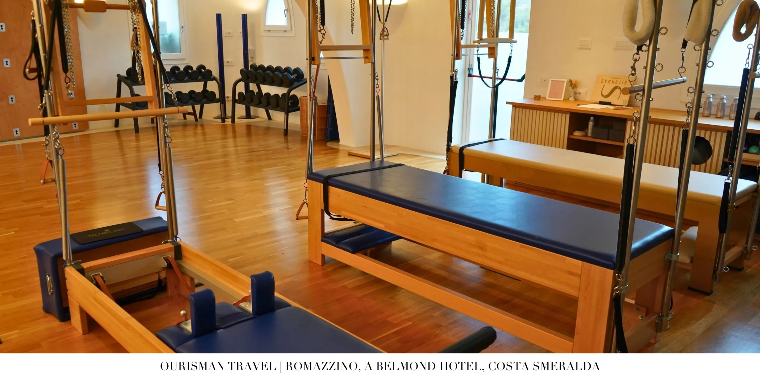 Fitness center interior at Romazzino Belmond with modern equipment and natural light