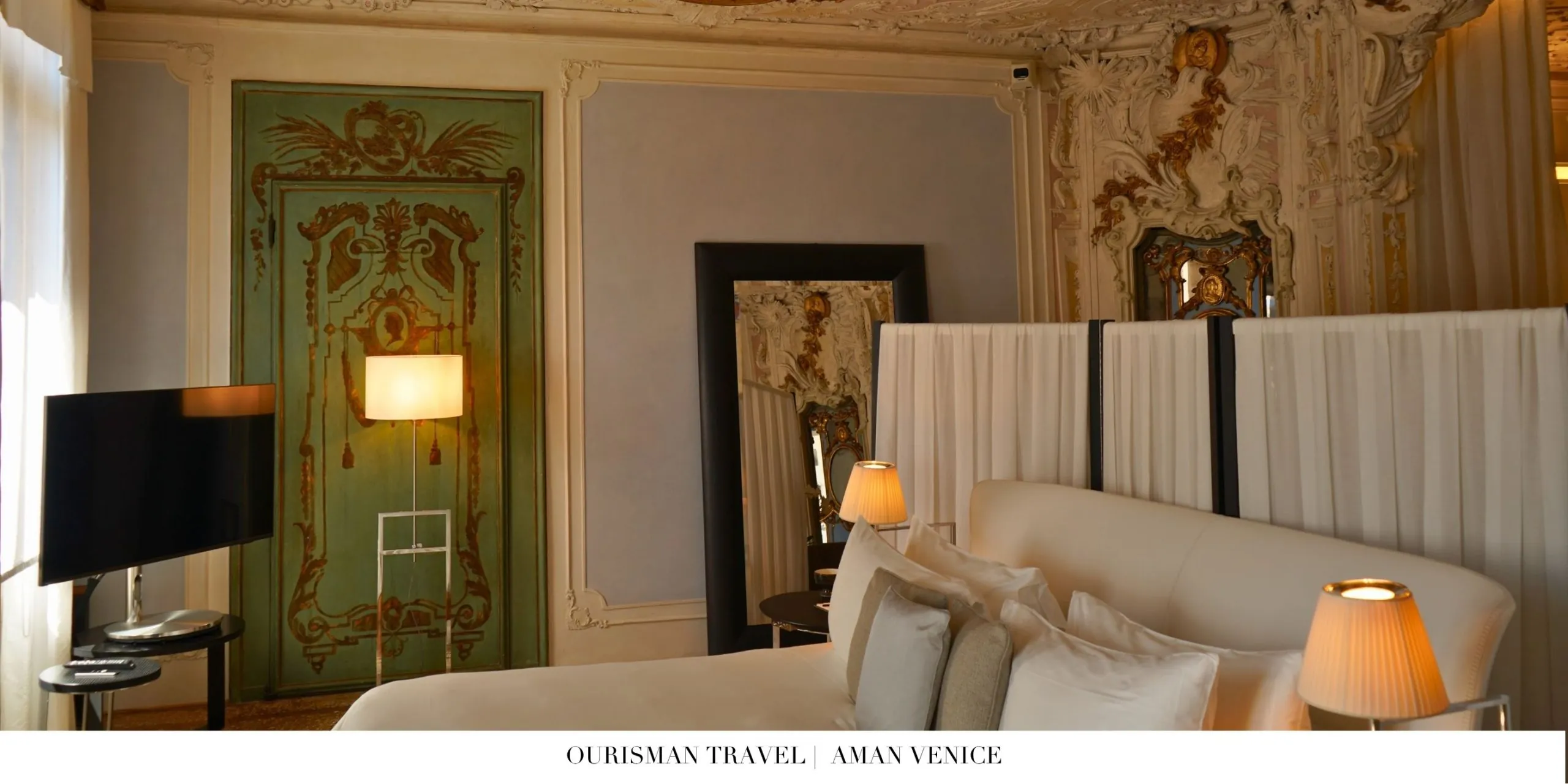 Aman Venice bedroom with high ceilings and historic architectural features