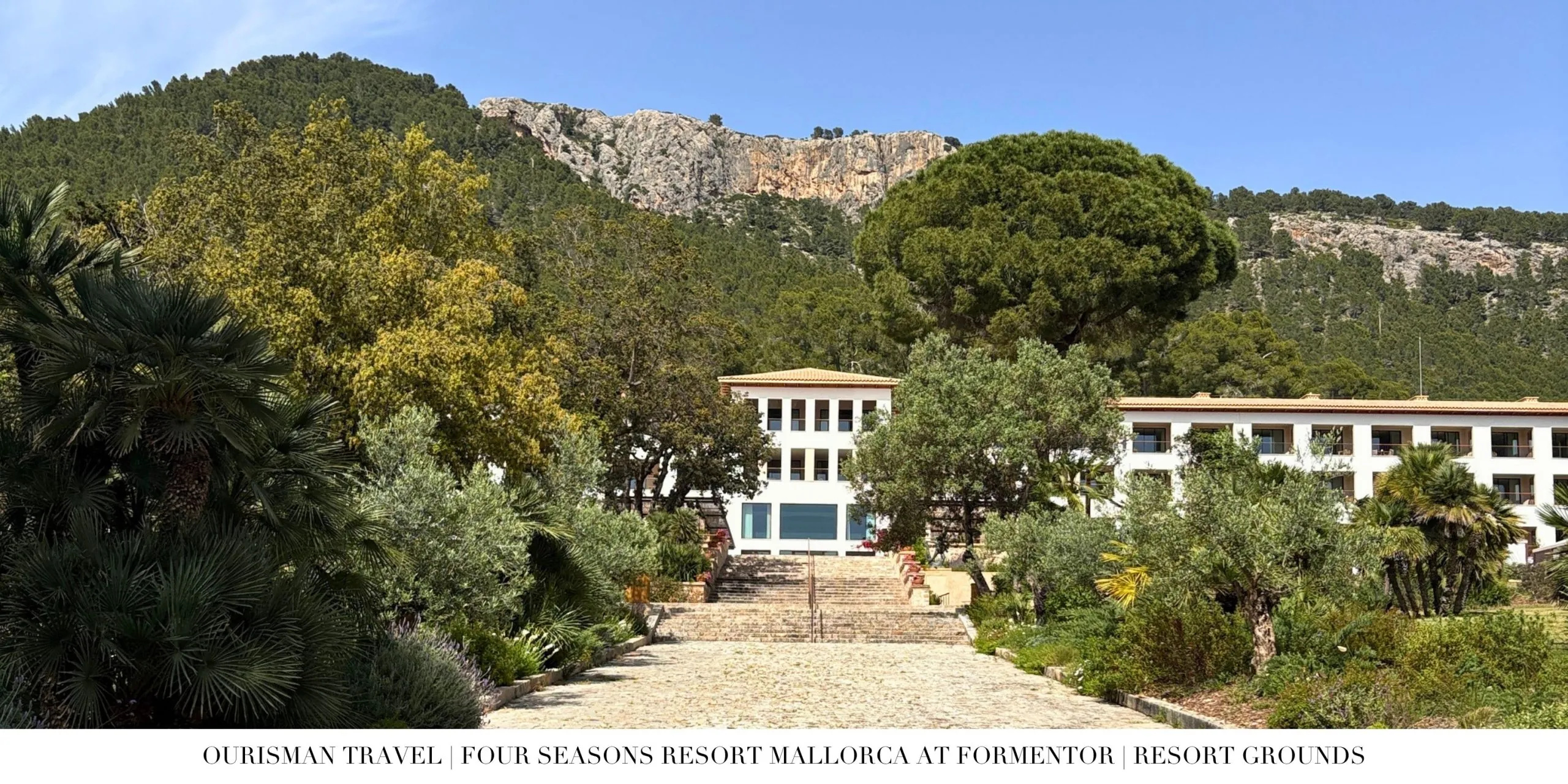 Exterior view of Four Seasons Resort Mallorca at Formentor surrounded by the Serra de Tramuntana mountains