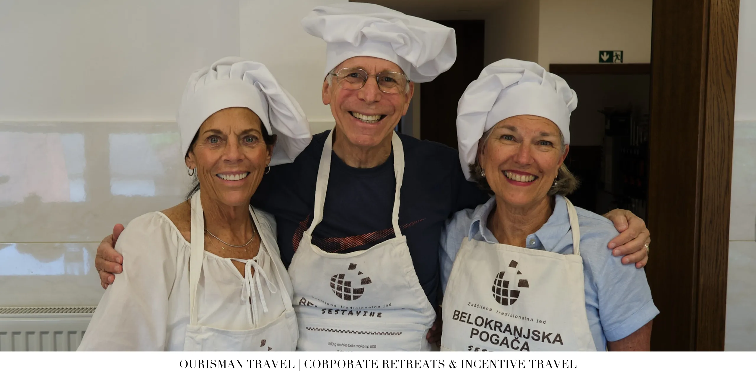 Corporate retreat attendees participating in a hands-on cooking class