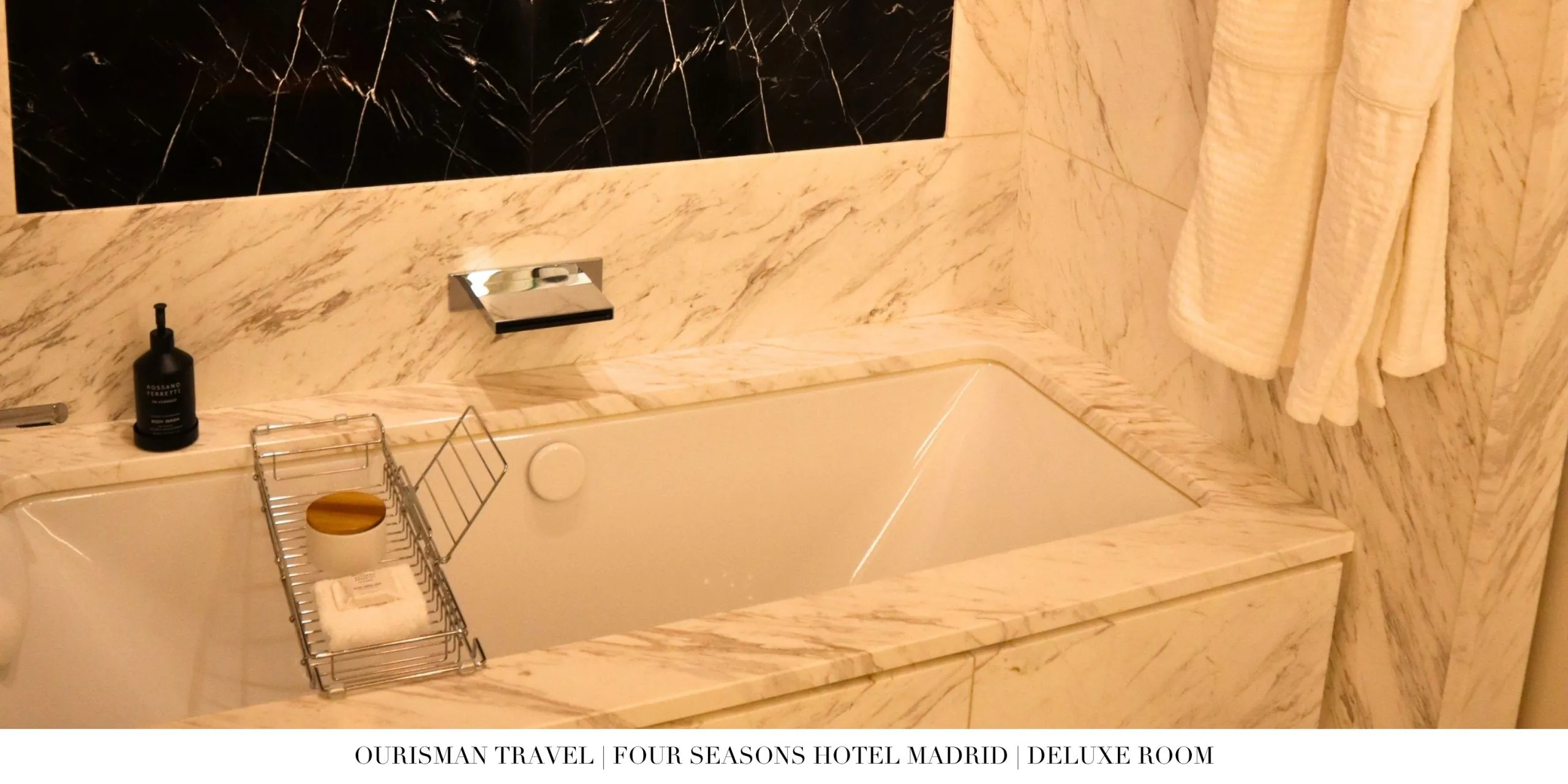Marble bathtub in a deluxe room at Four Seasons Madrid