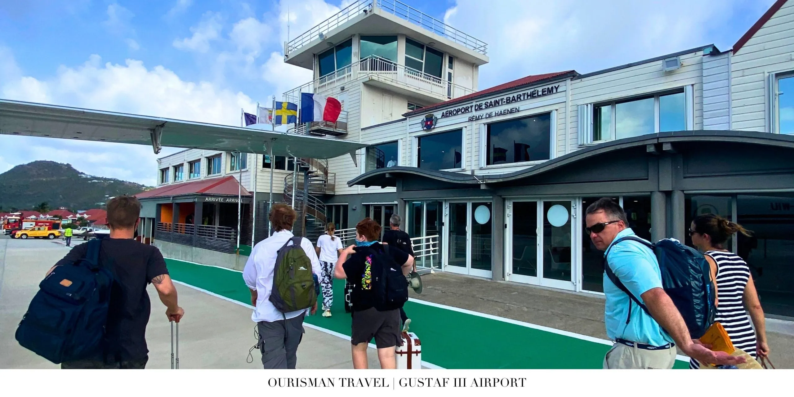 View of Gustaf III Airport in St. Barth with aircraft and Caribbean surroundings