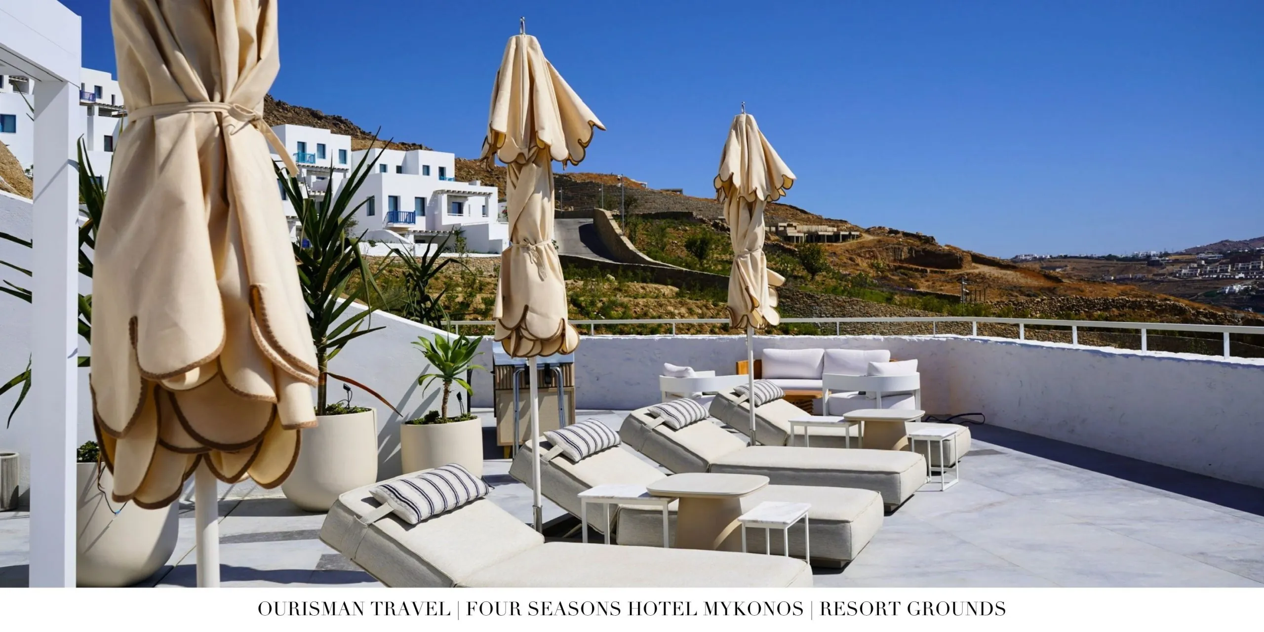 Main pool at Four Seasons Mykonos overlooking the Aegean Sea