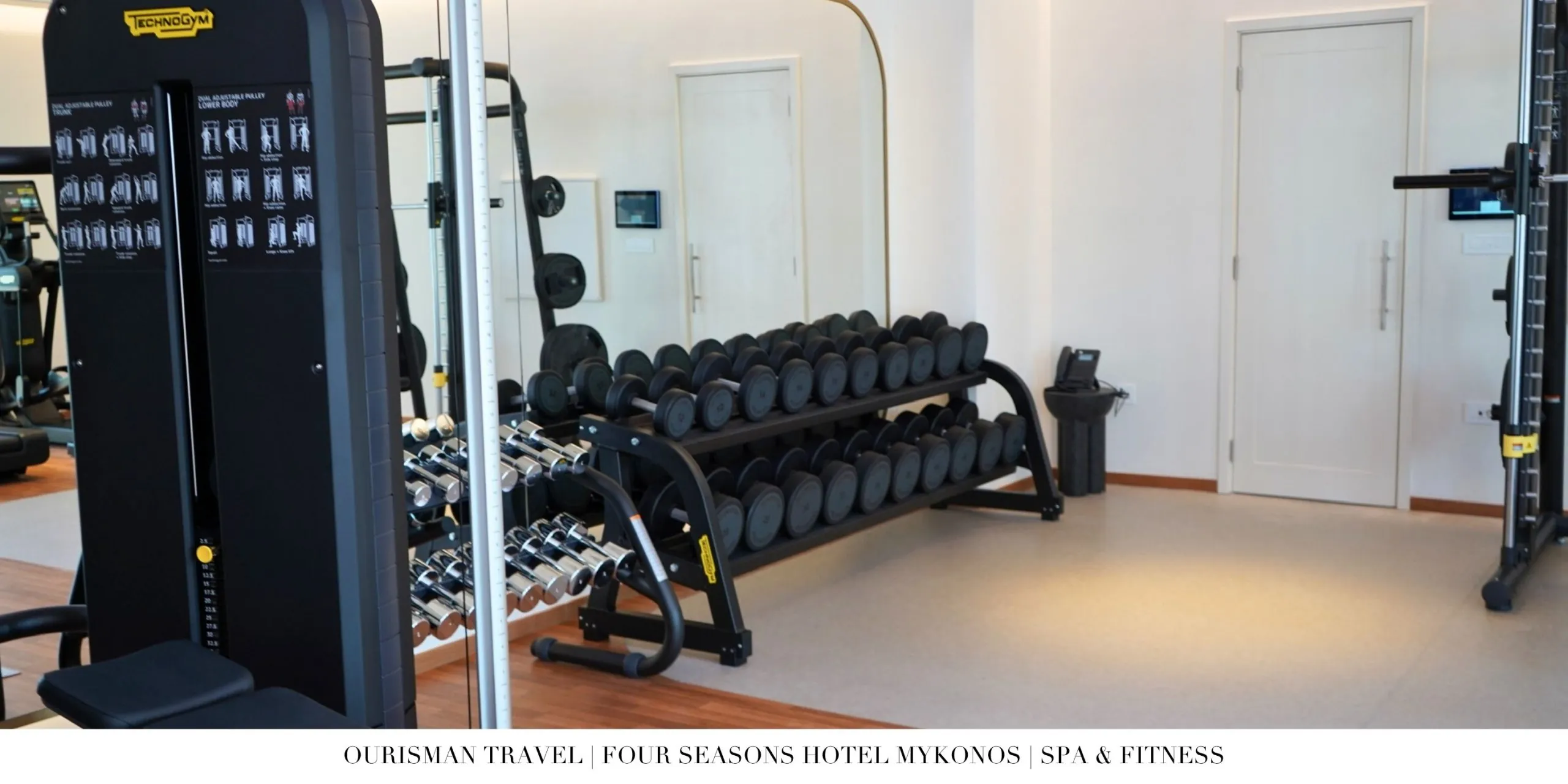 Free weights in the fitness center at Four Seasons Mykonos