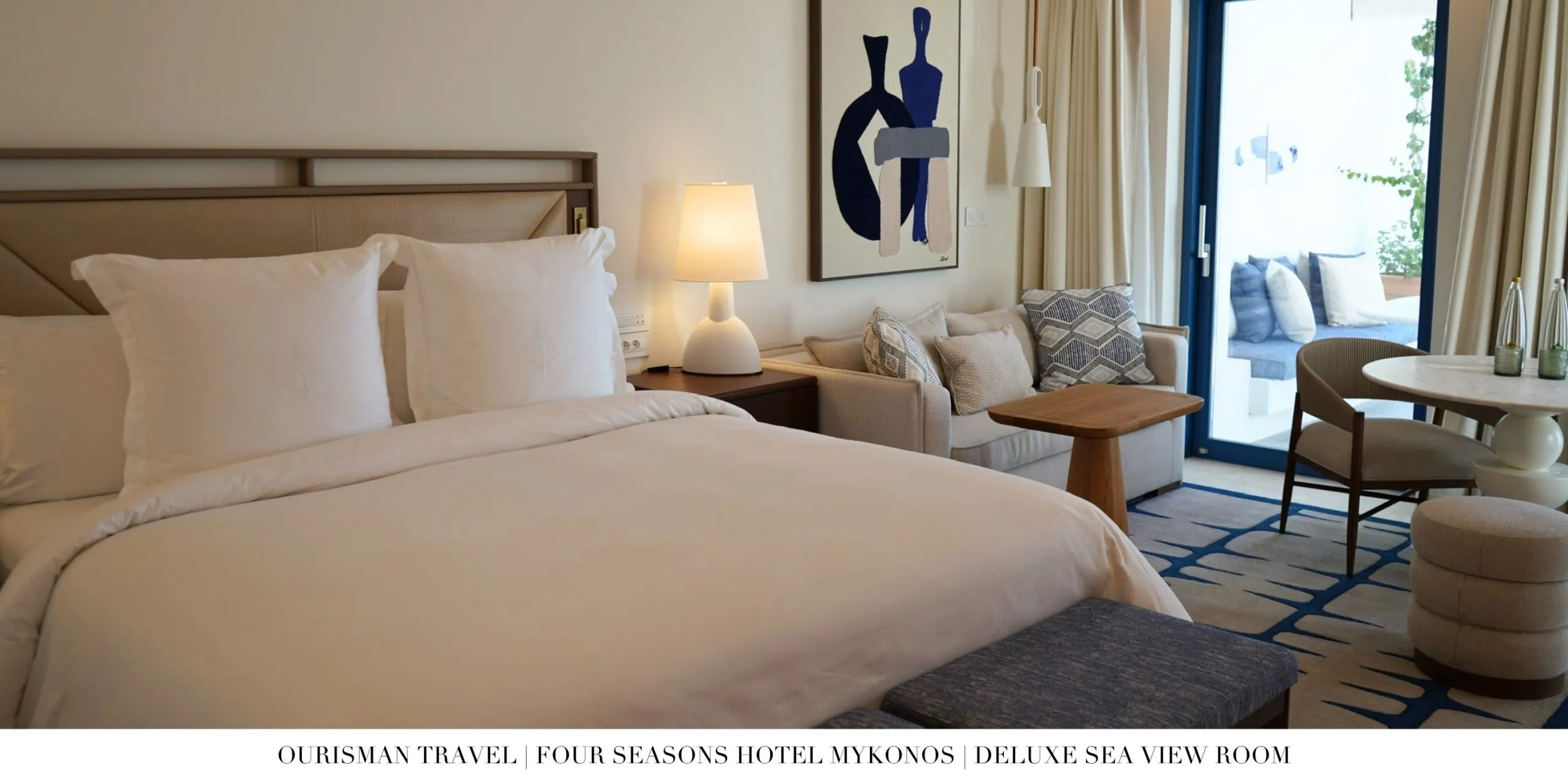 King bed in the Deluxe Sea-View Room at Four Seasons Mykonos