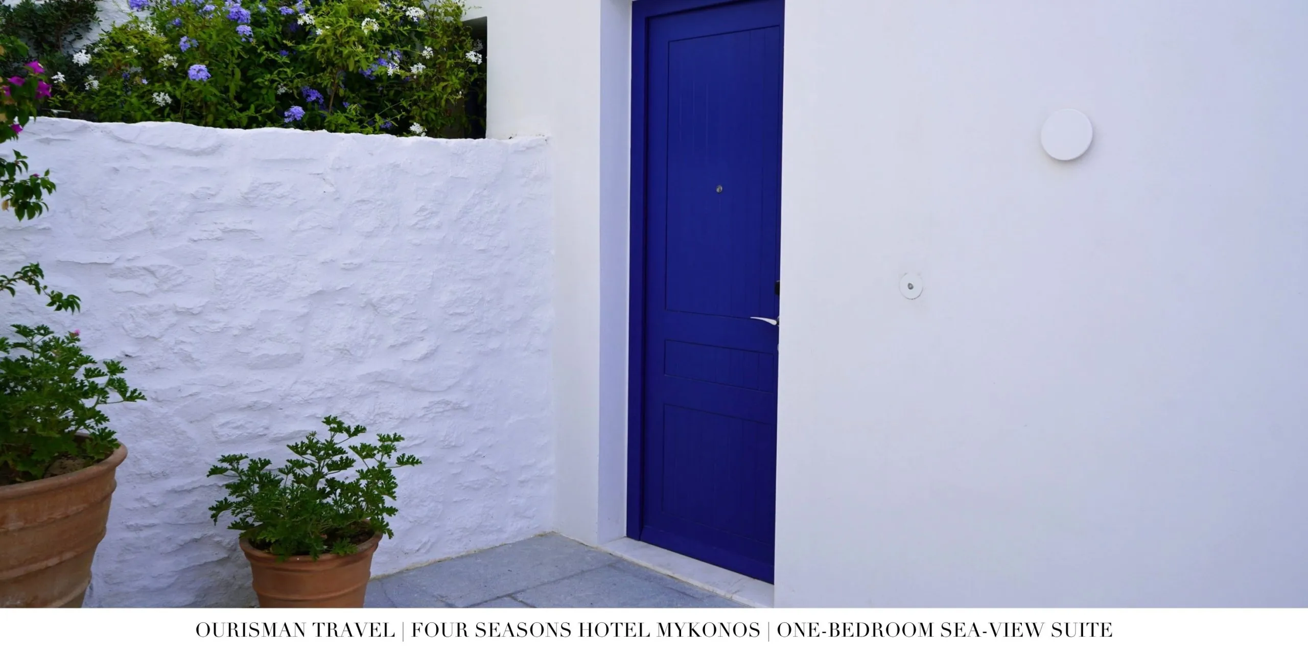 Blue entrance door to the One-Bedroom Sea-View Suite at Four Seasons Mykonos