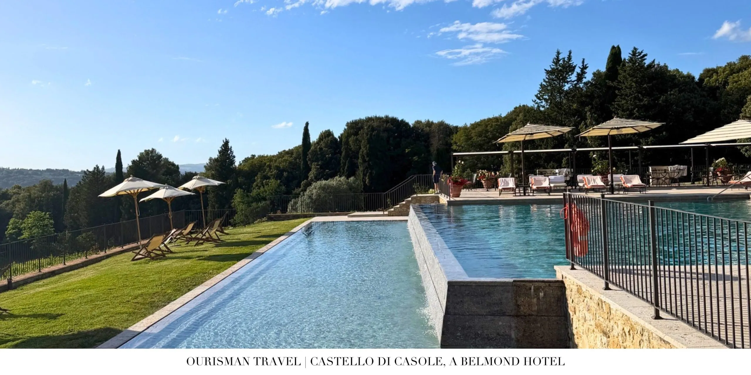 Infinity pool at Castello di Casole with views of the Tuscan countryside.