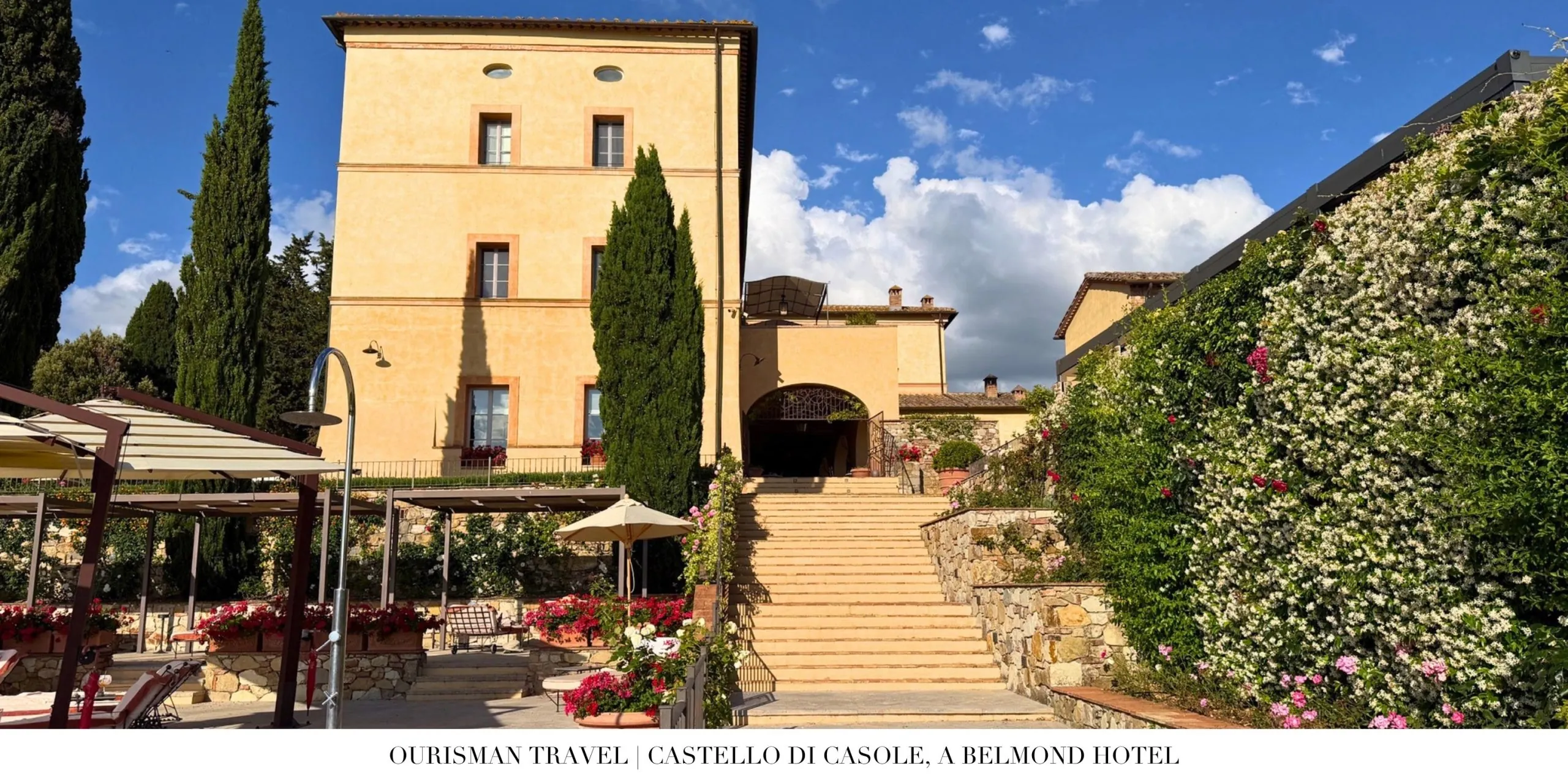 Historic stone staircase leading through the grounds of Castello di Casole, a Belmond Hotel in Tuscany.
