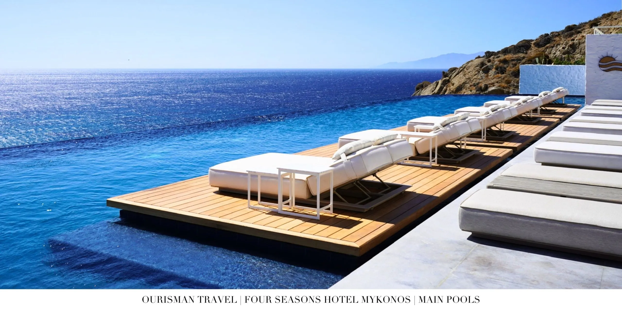Main pool at Four Seasons Mykonos overlooking the Aegean Sea