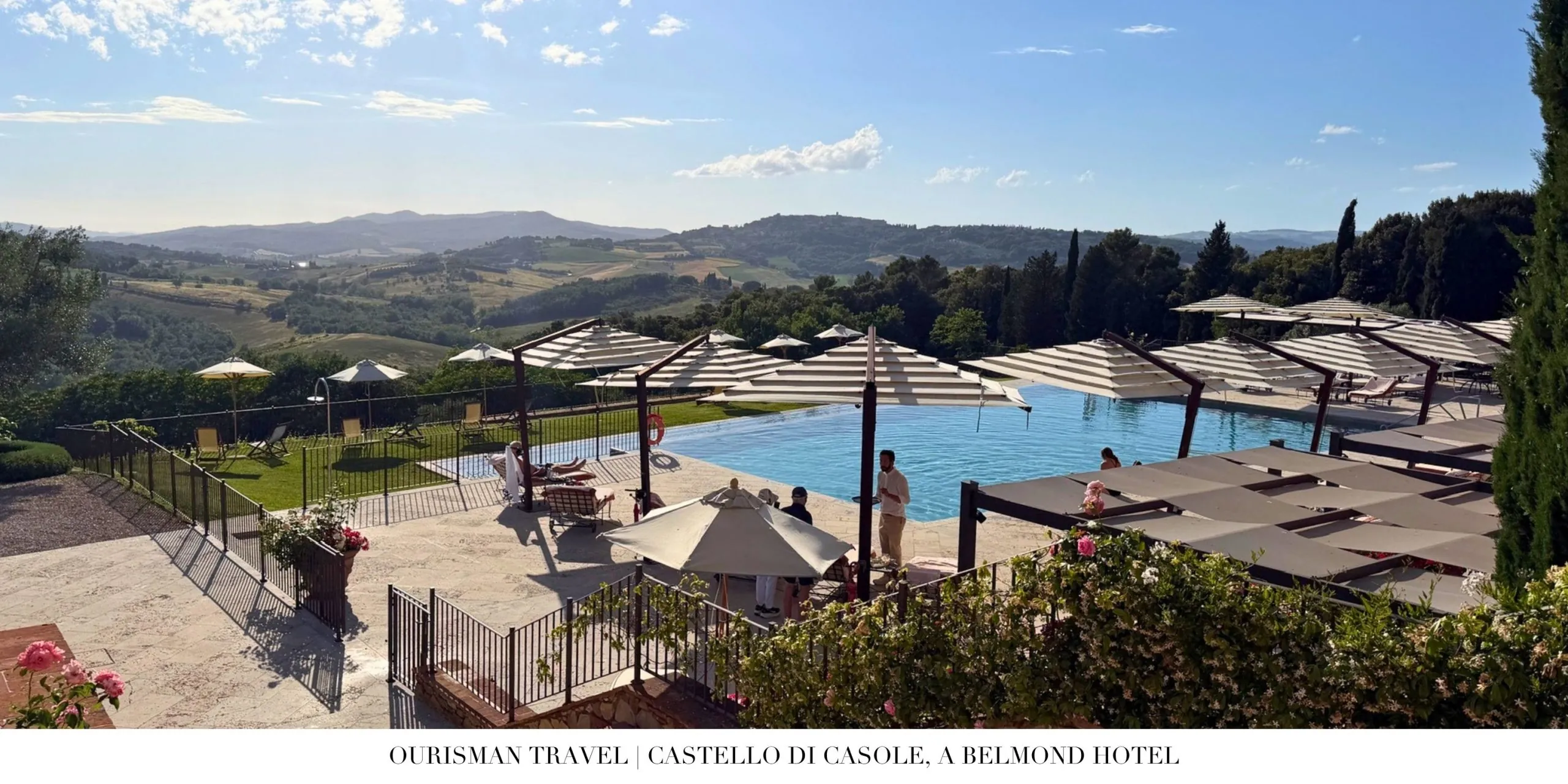 Infinity pool terrace at Castello di Casole overlooking Tuscany.