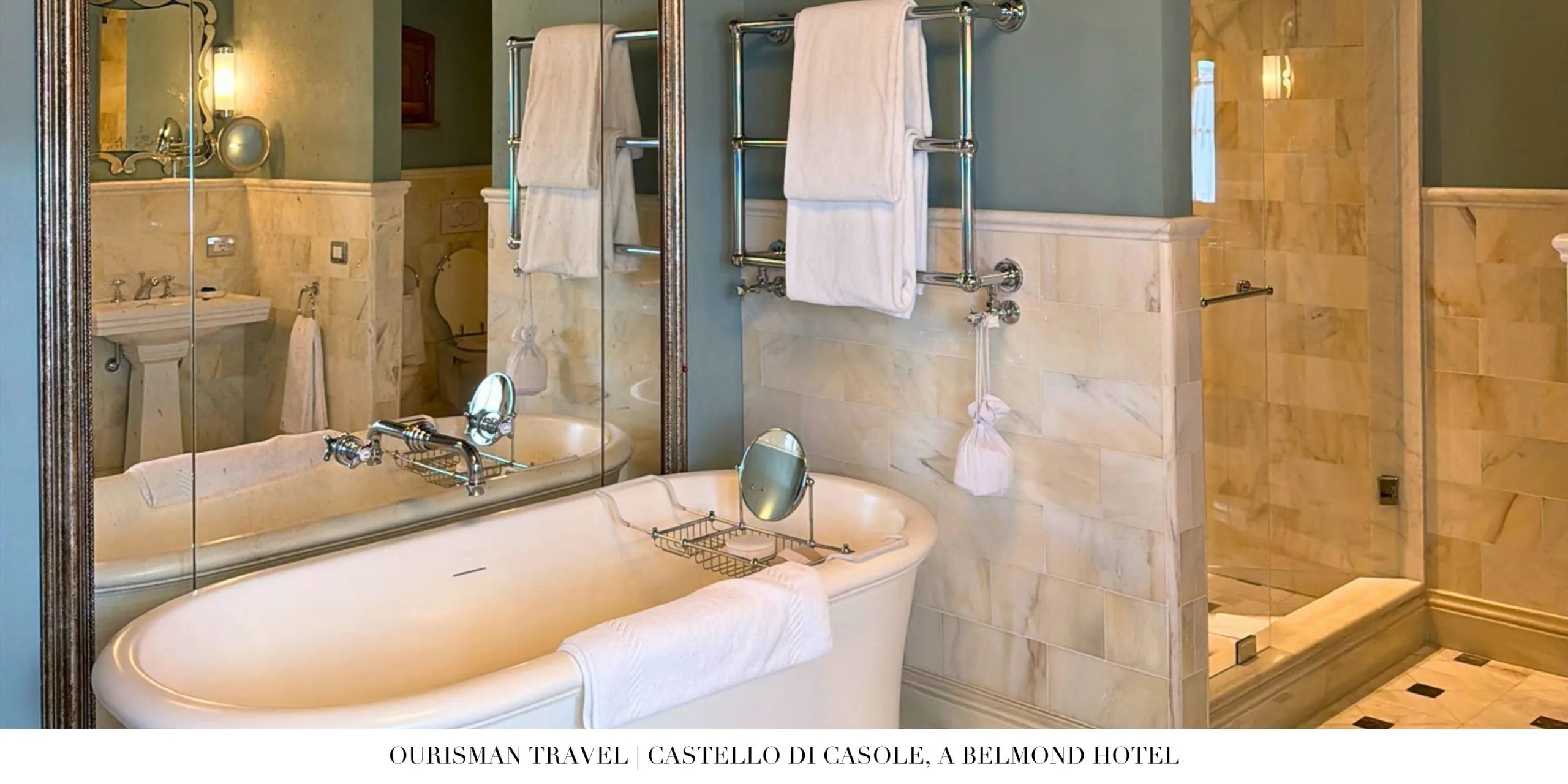 Freestanding soaking tub and walk-in shower in the Premium Junior Suite at Castello di Casole.