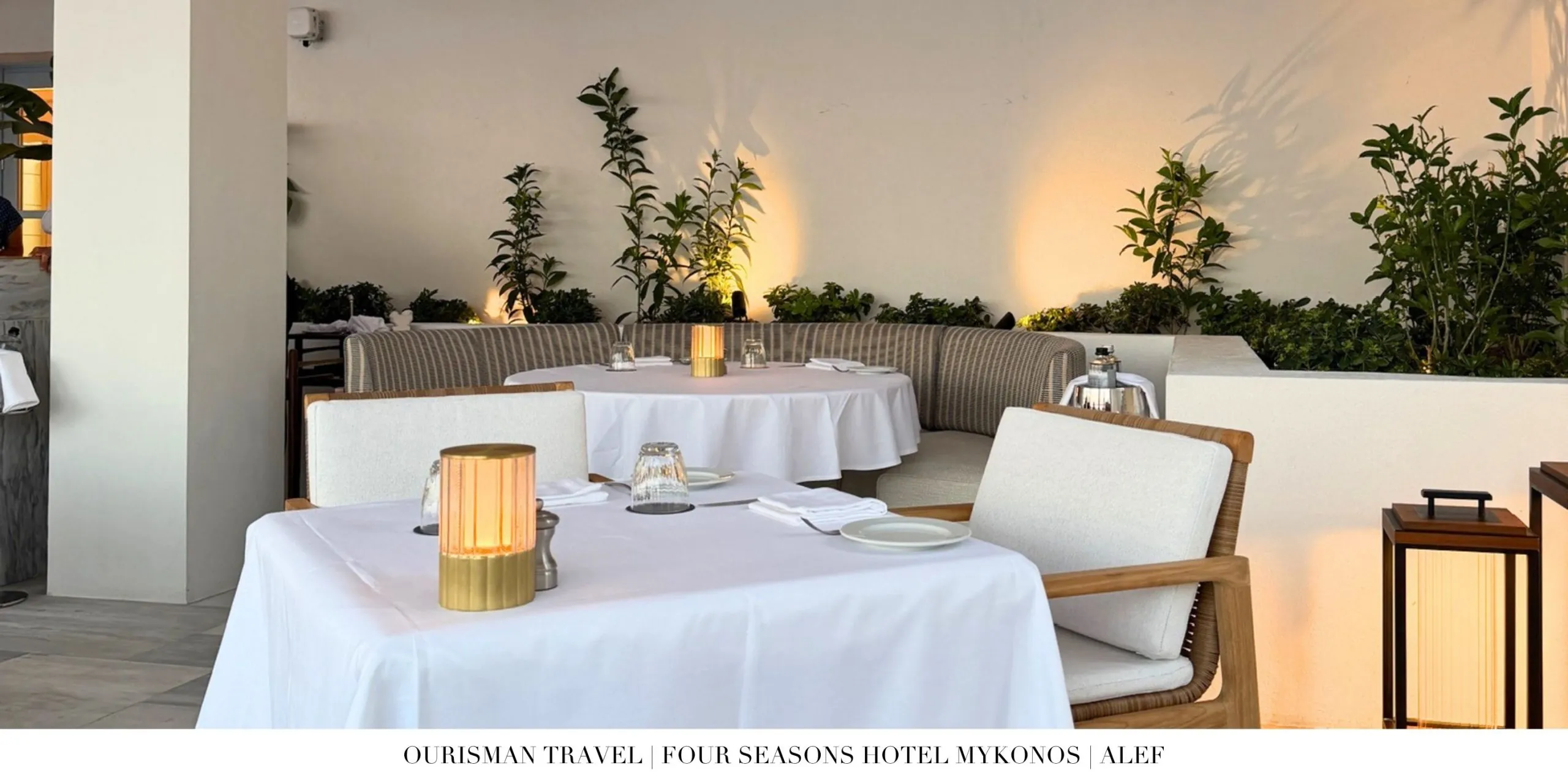 Outdoor dining terrace at Álef restaurant at Four Seasons Mykonos